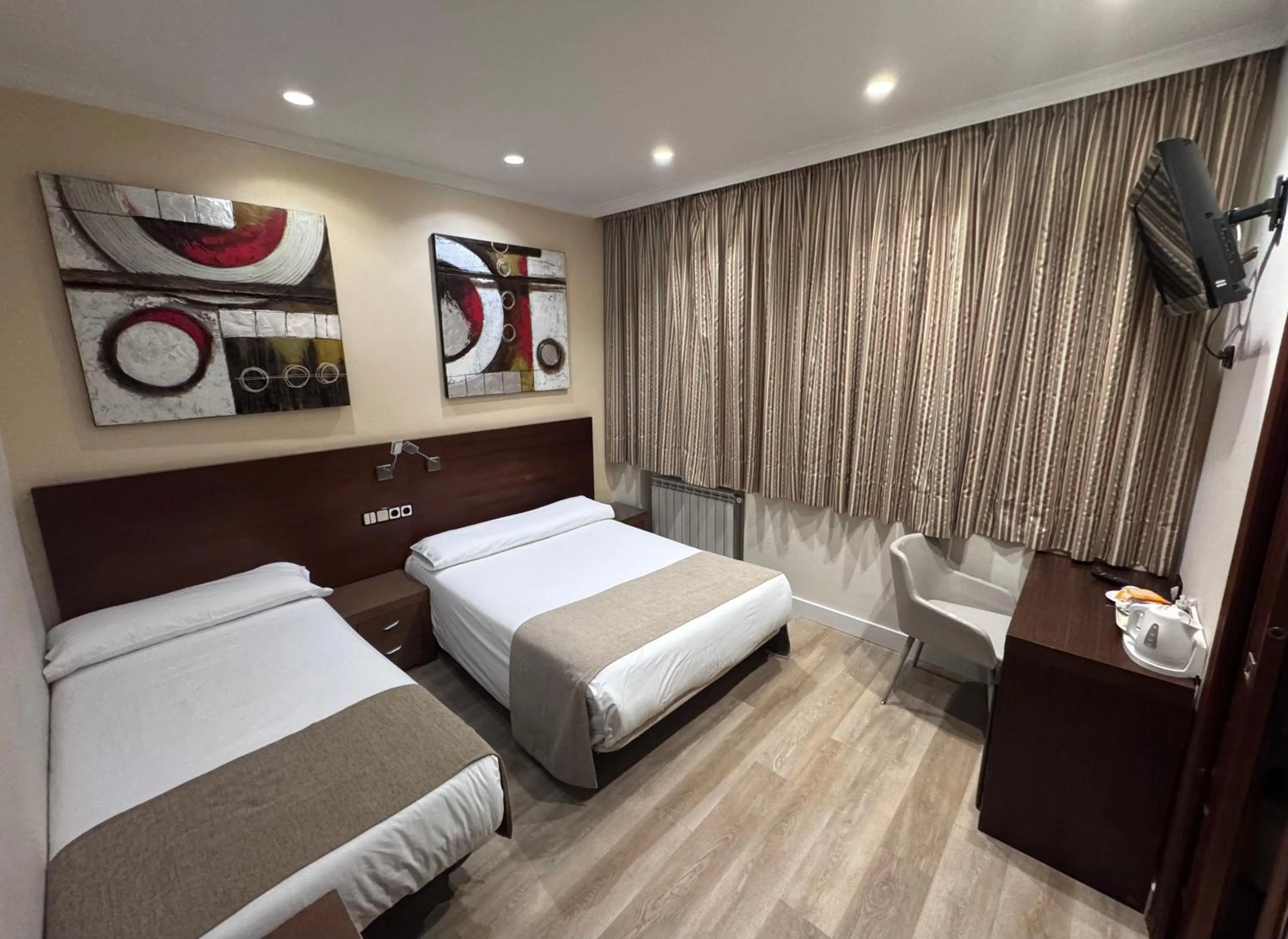 Bed in Hostal Atocha Almudena Martín