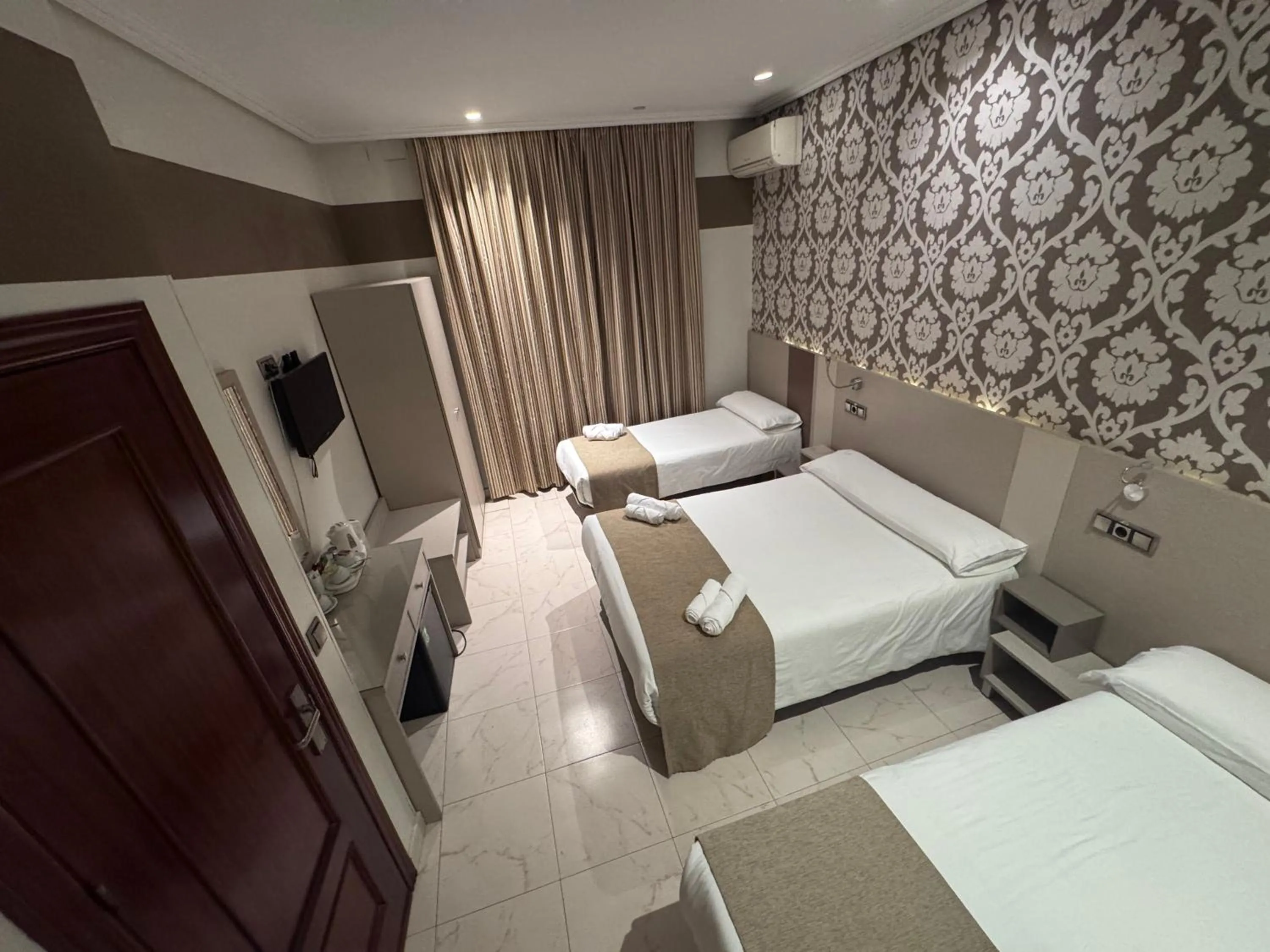 Bed in Hostal Atocha Almudena Martín