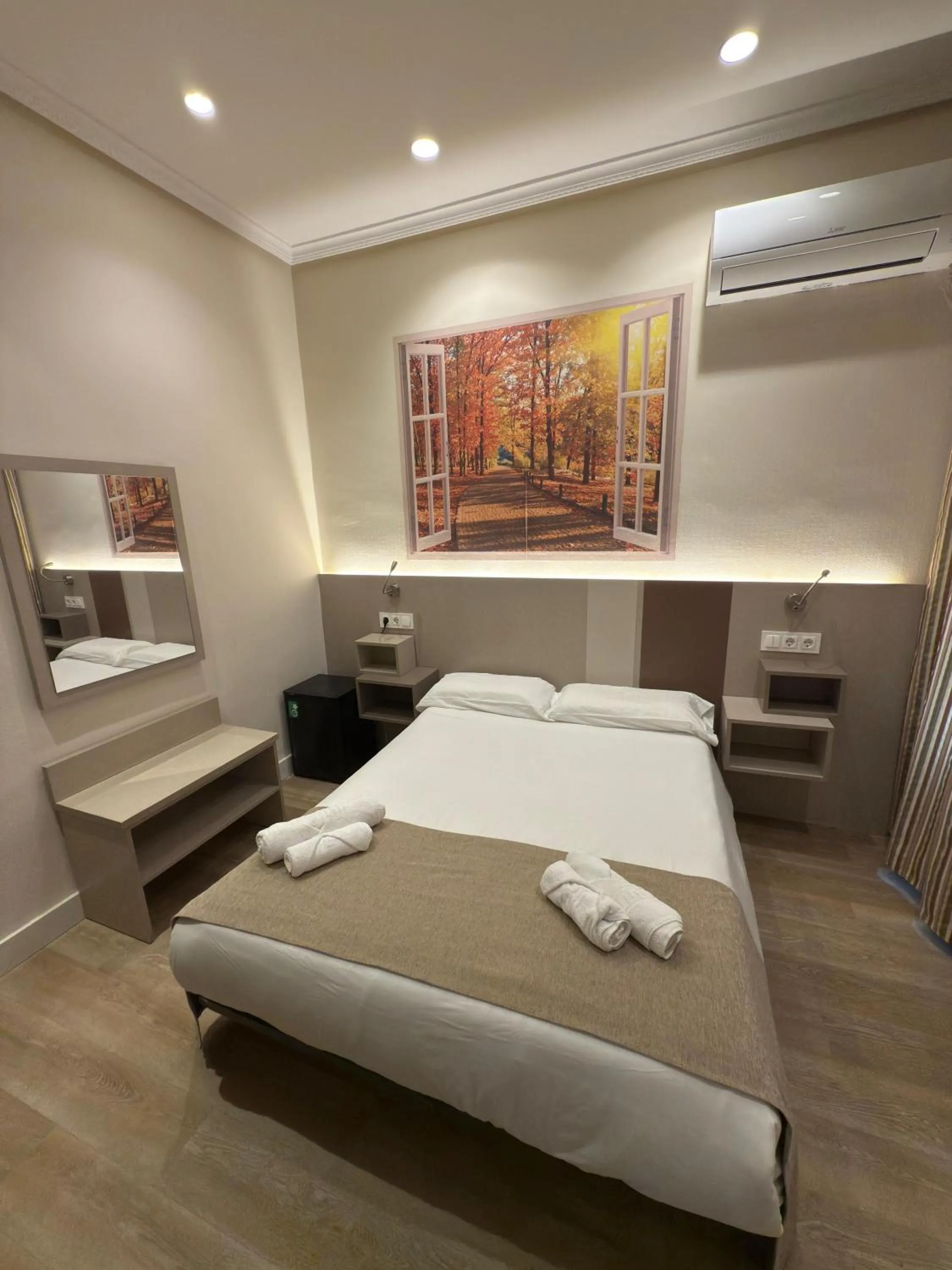 Bed in Hostal Atocha Almudena Martín