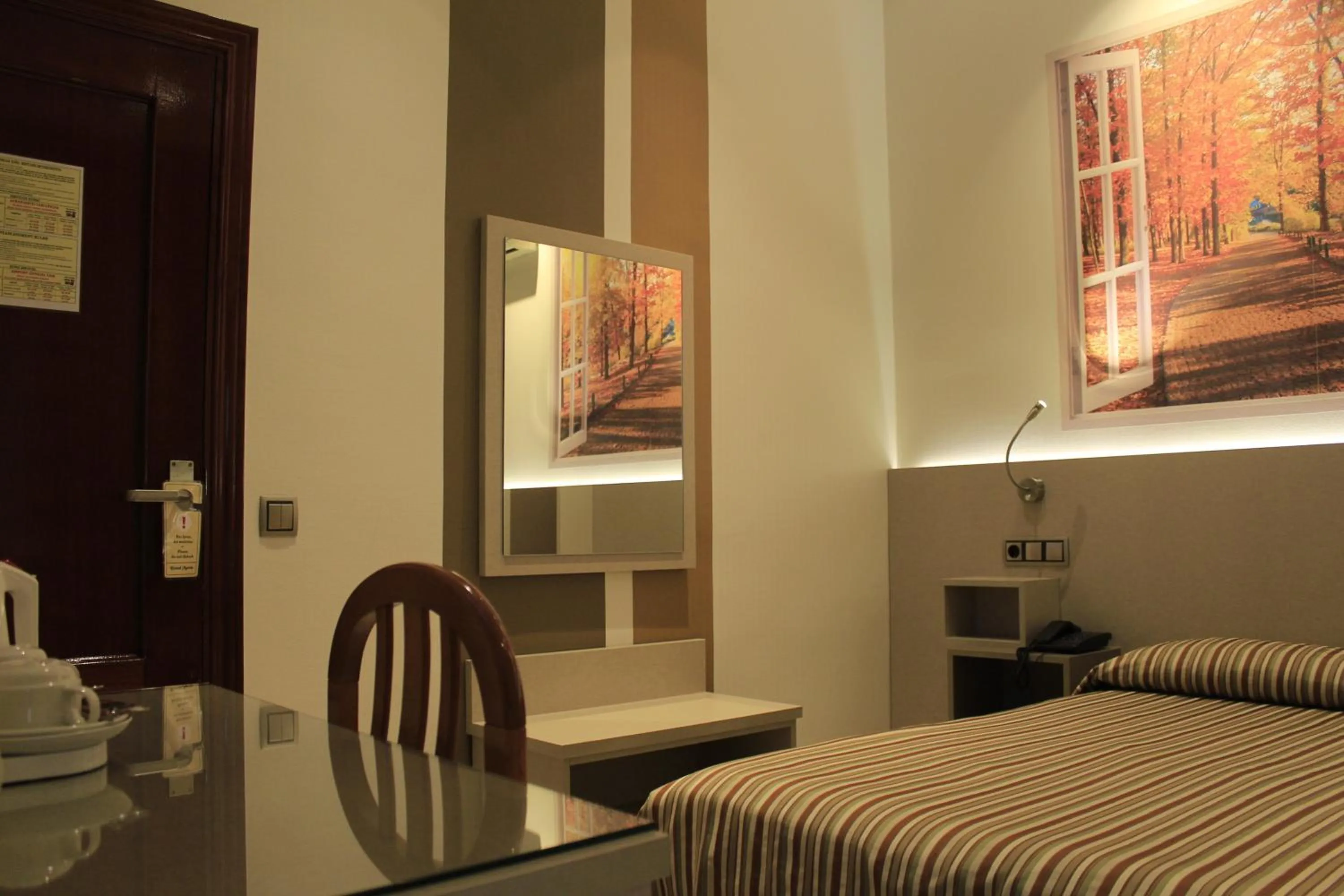 Bed in Hostal Atocha Almudena Martín