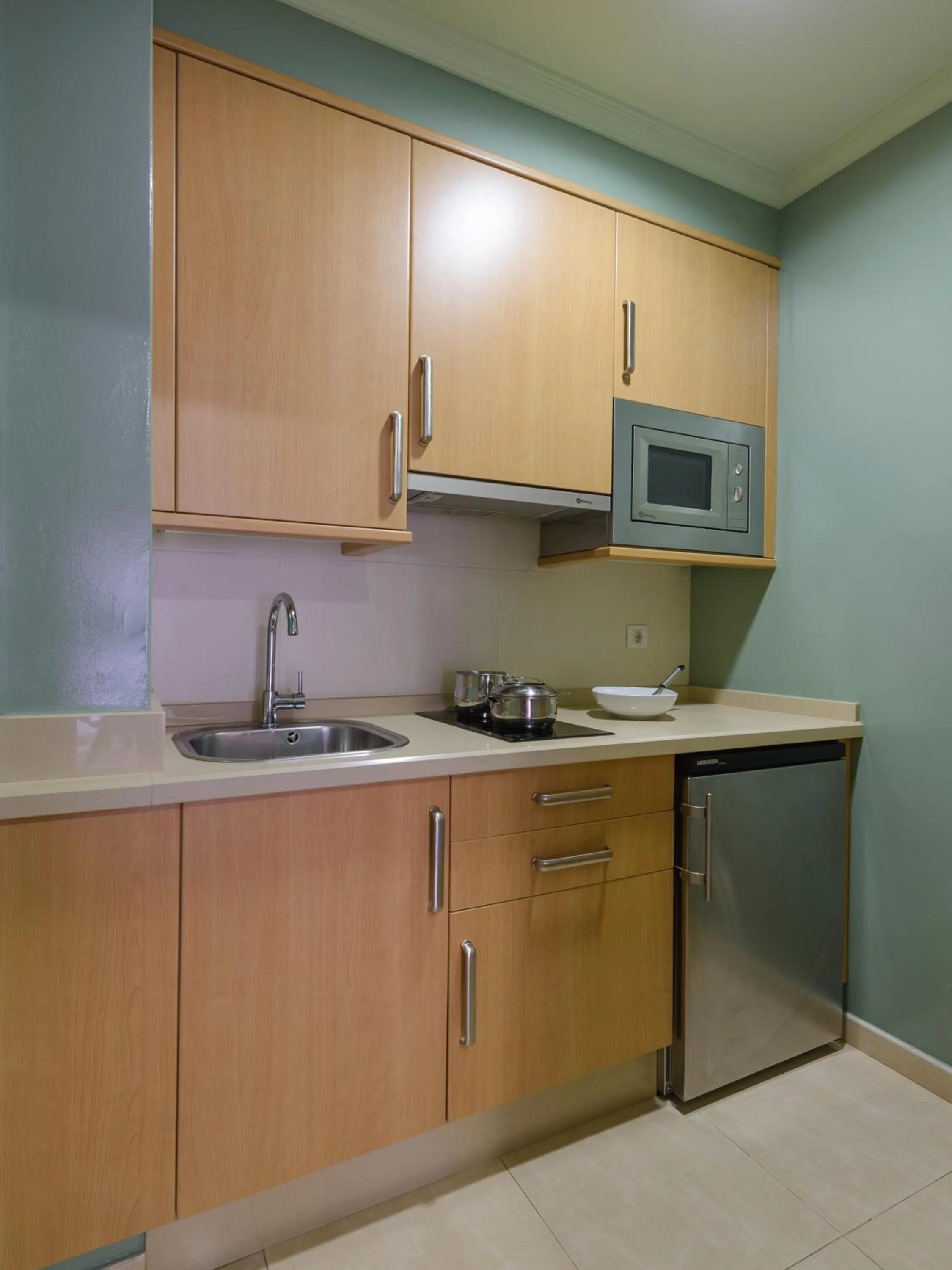 Kitchen or kitchenette in Apartamentos Trisquel