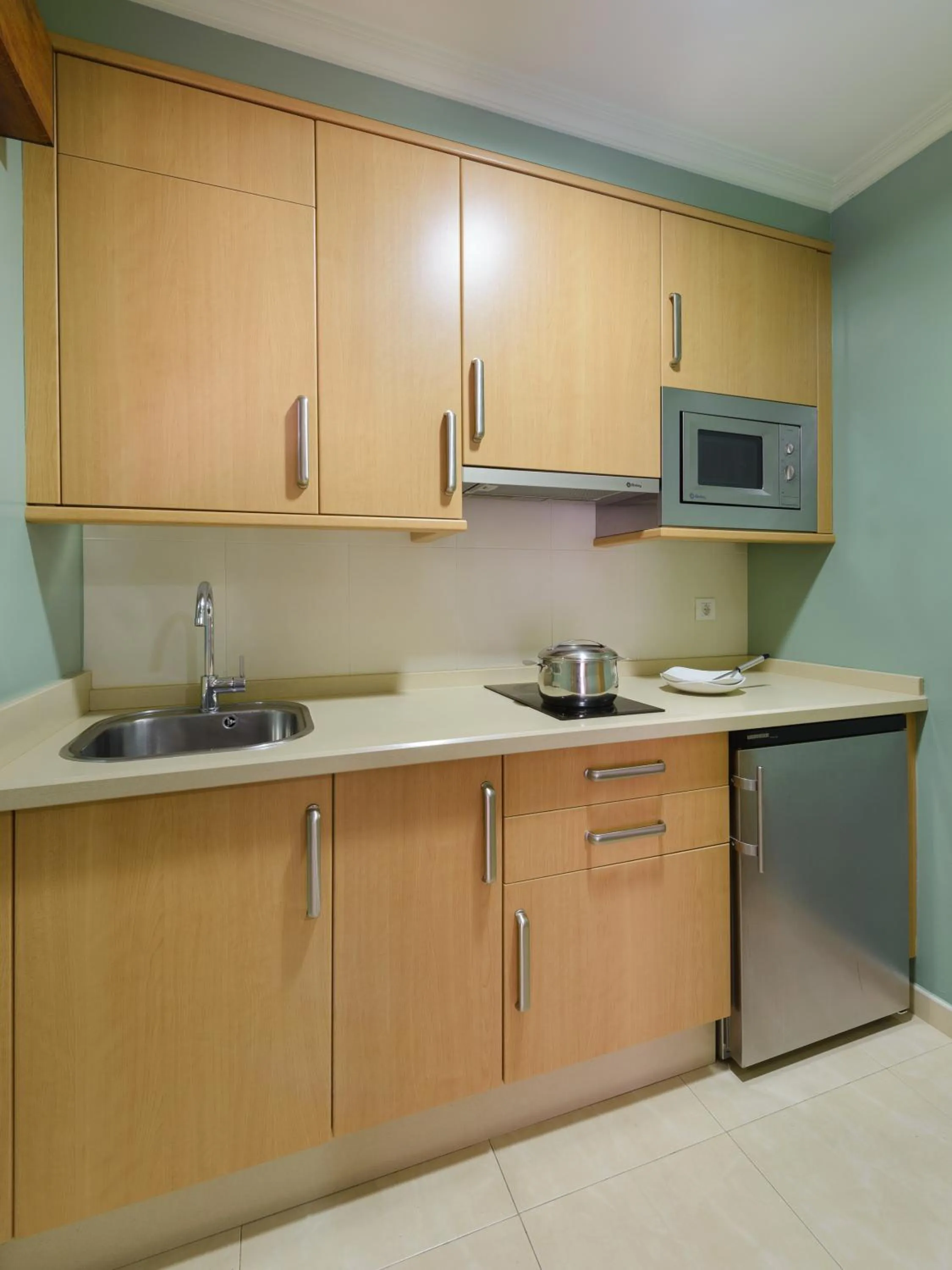 Kitchen or kitchenette in Apartamentos Trisquel