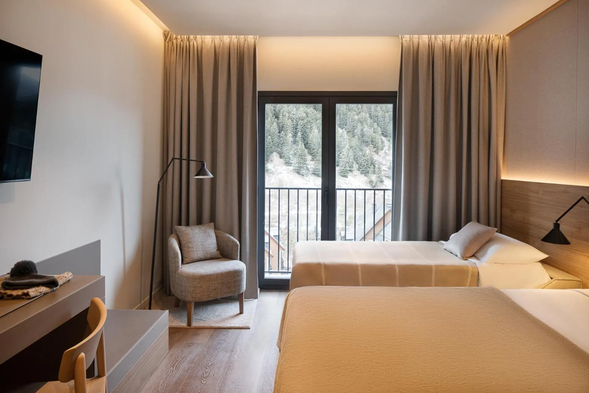 Bed in Hotel MIM Baqueira Luxury & SPA
