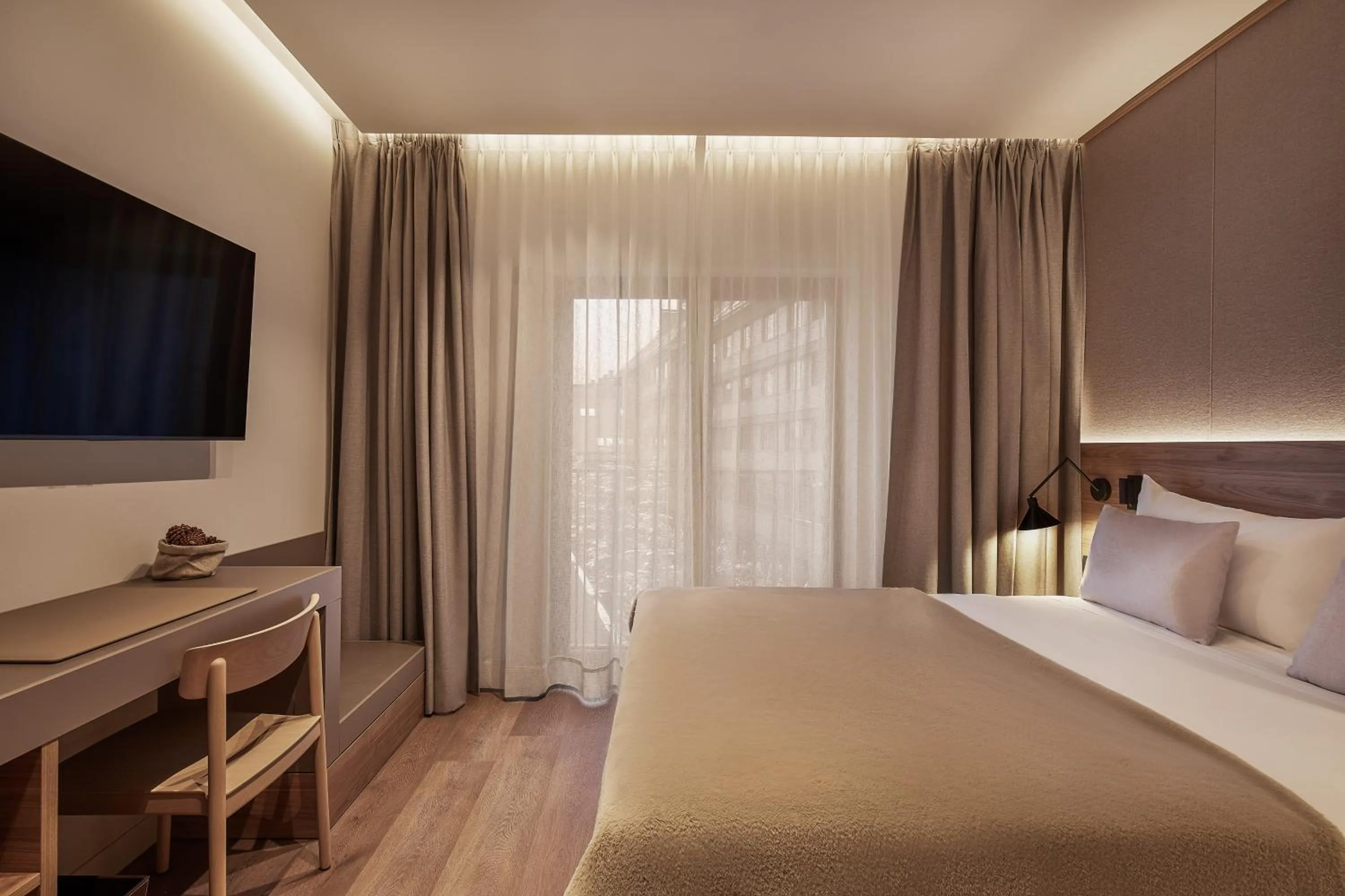 Bed in Hotel MIM Baqueira Luxury & SPA