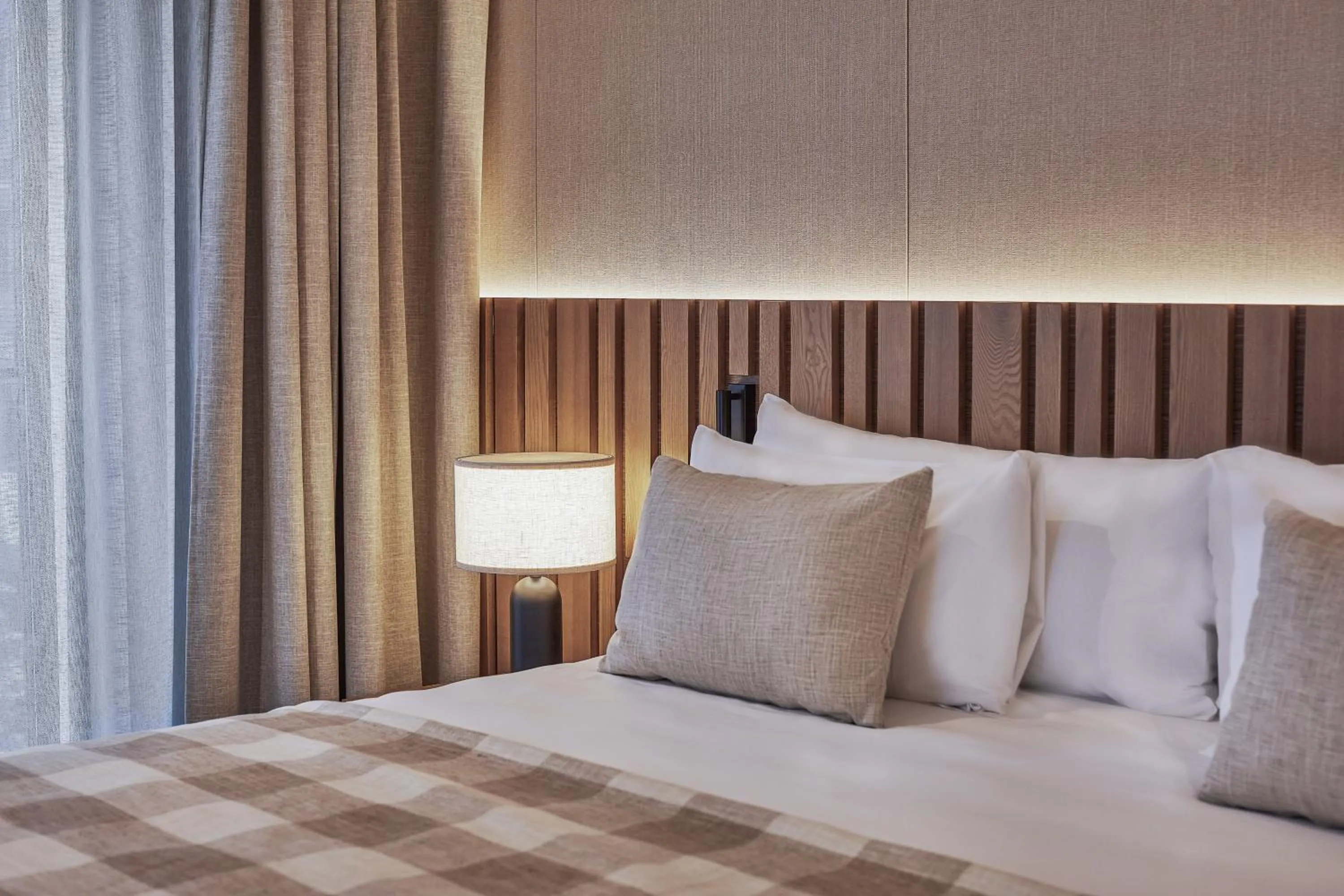 Bed in Hotel MIM Baqueira Luxury & SPA