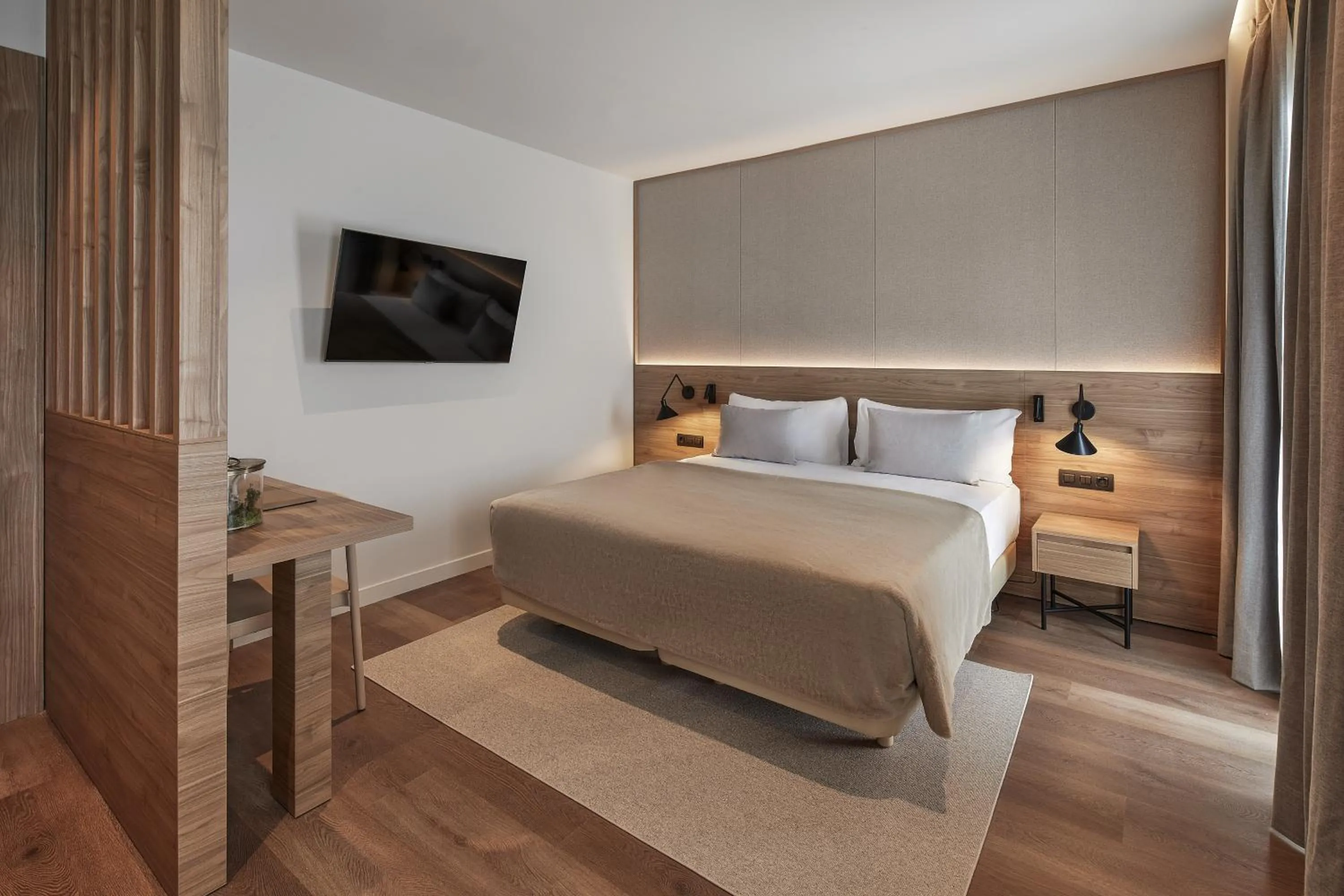 Bed in Hotel MIM Baqueira Luxury & SPA