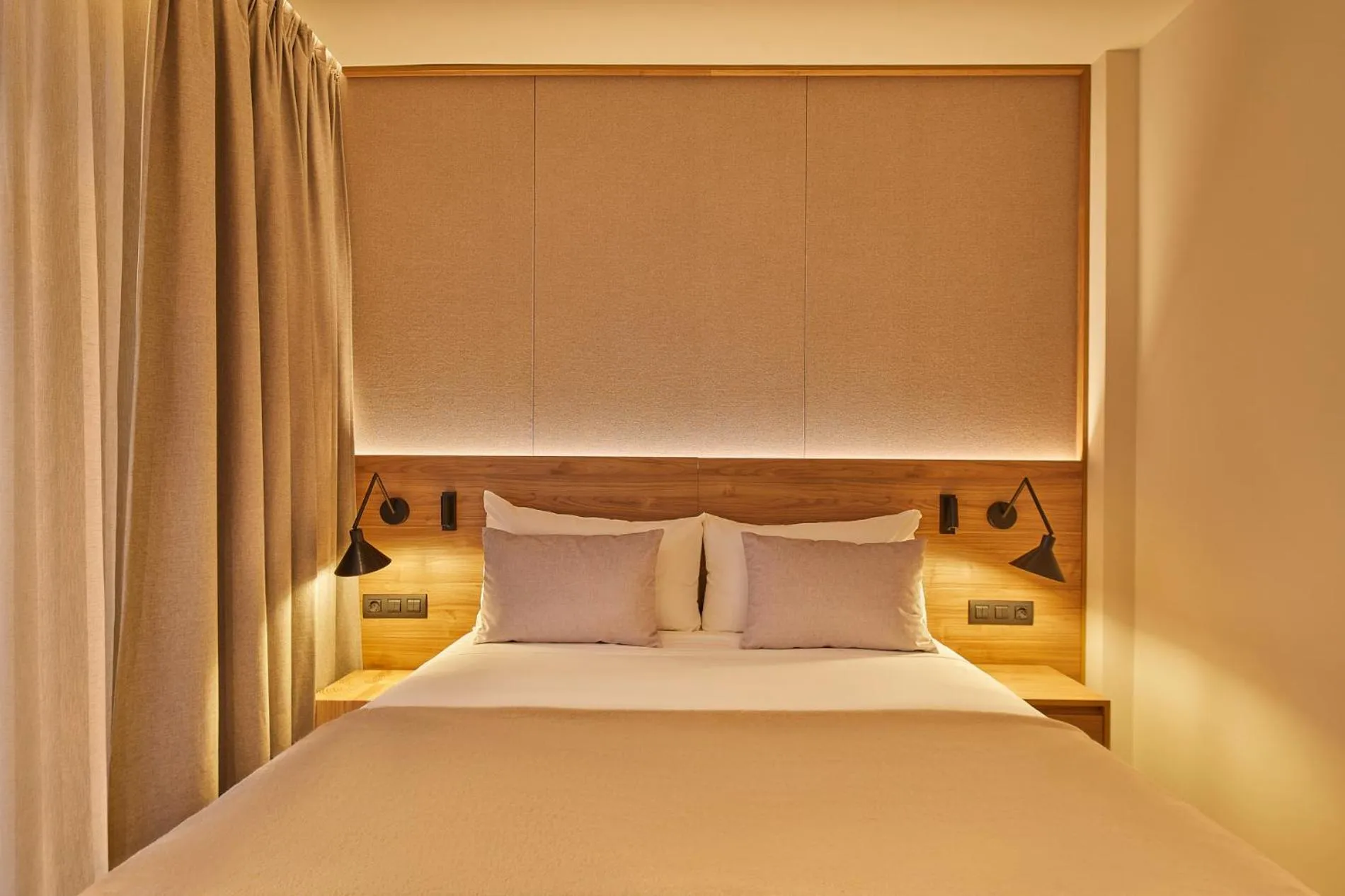 Bed in Hotel MIM Baqueira Luxury & SPA