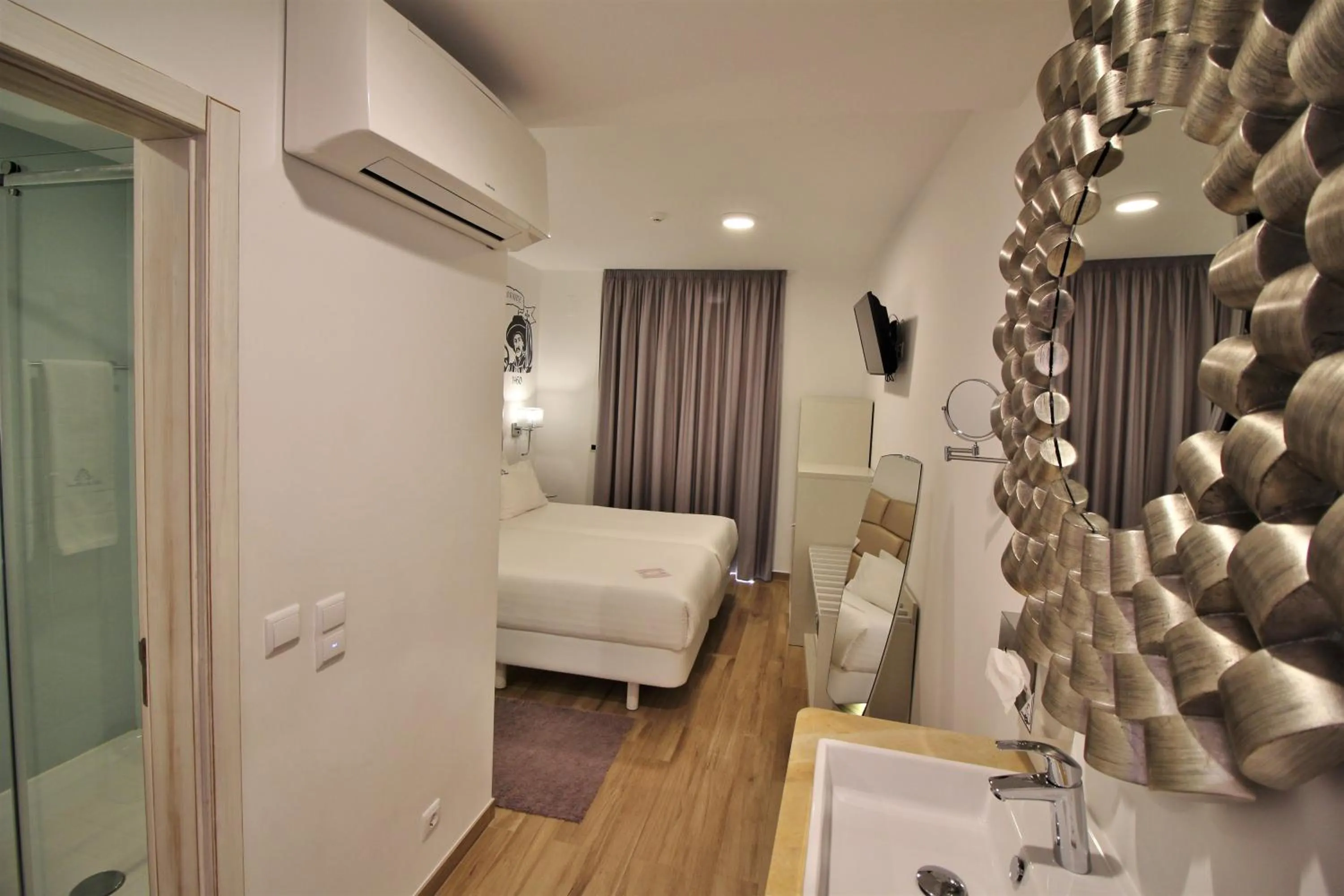 Bed in Villa Ana Margarida Hotel