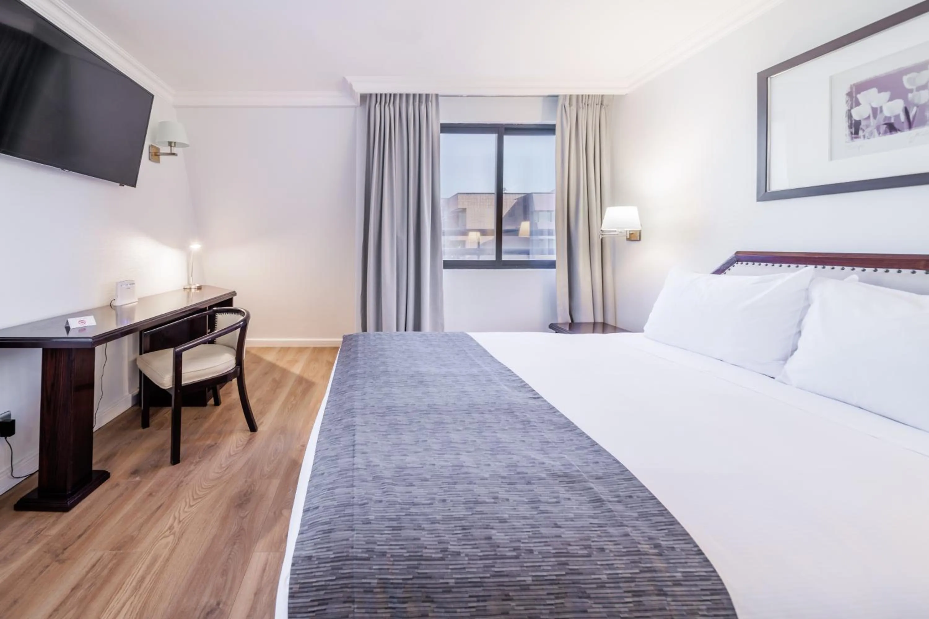 Bed in Wyndham Garden Santiago Kennedy