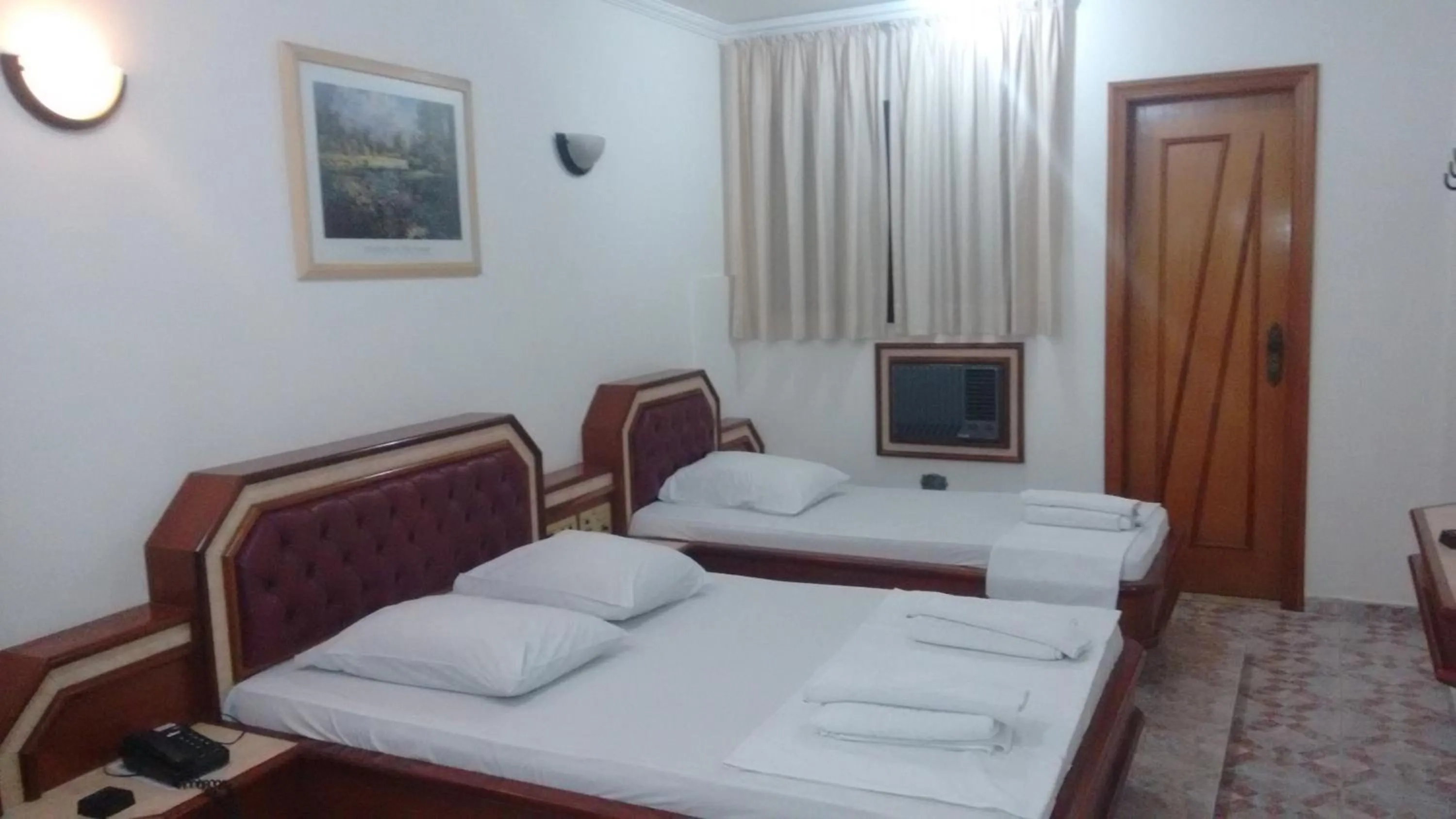 Triple Room in Paissandú Palace Hotel - Próximo às ruas 25 de Março, Sta Ifigênia e regiões do Brás e Bom Retiro