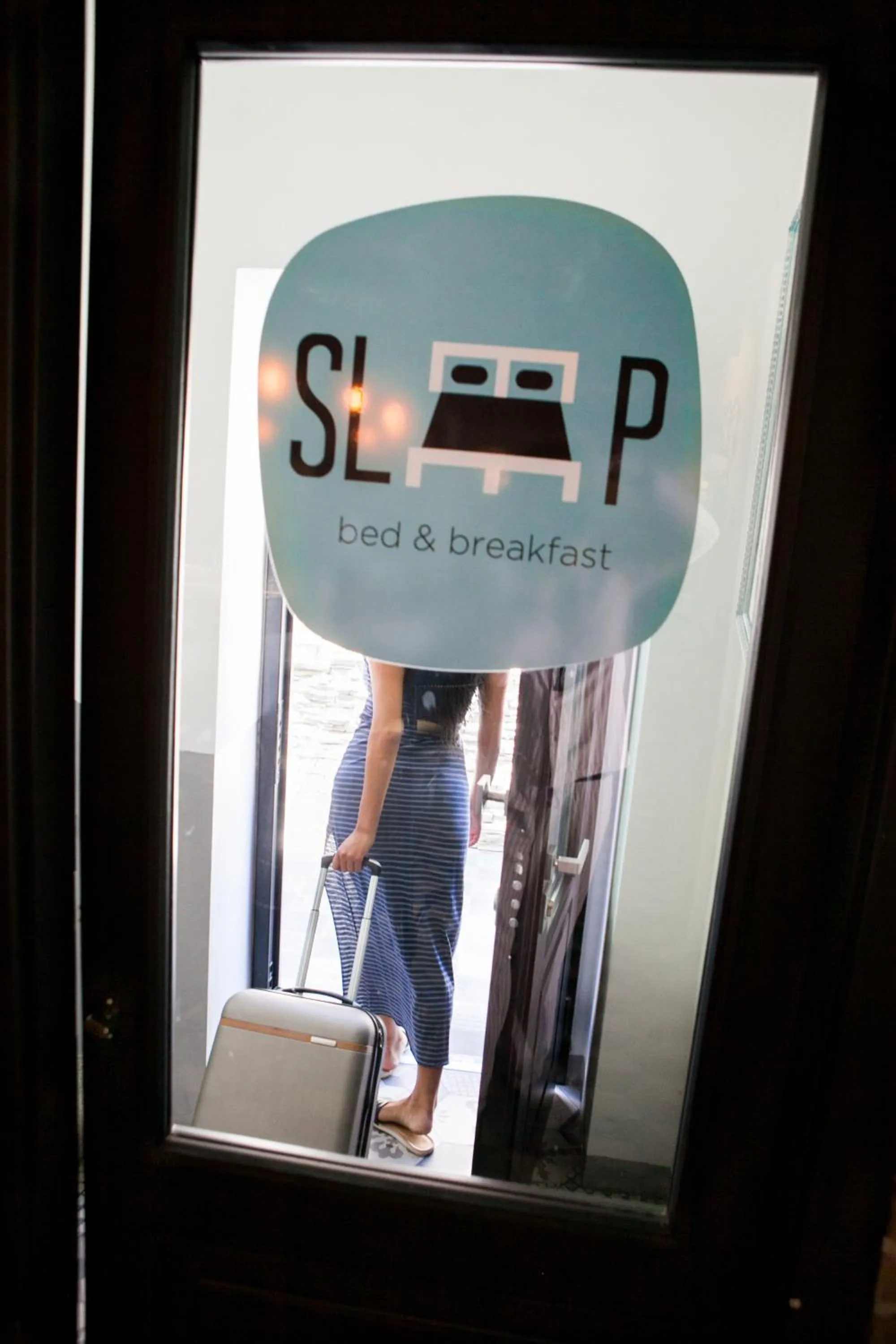 Property logo or sign in Sleep B&B