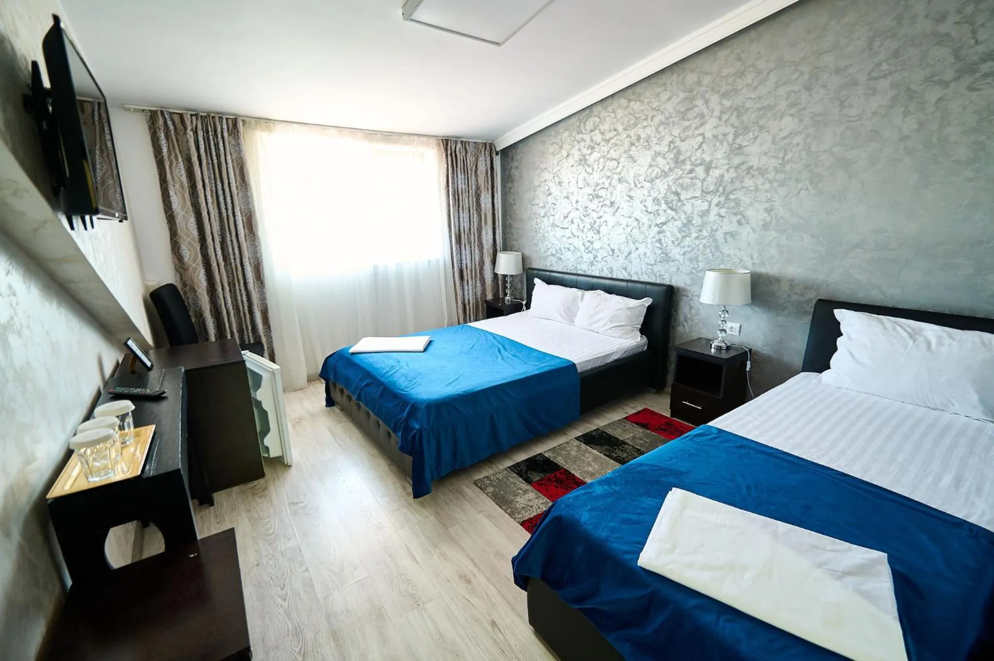 Bed in Hotel Evianne Boutique