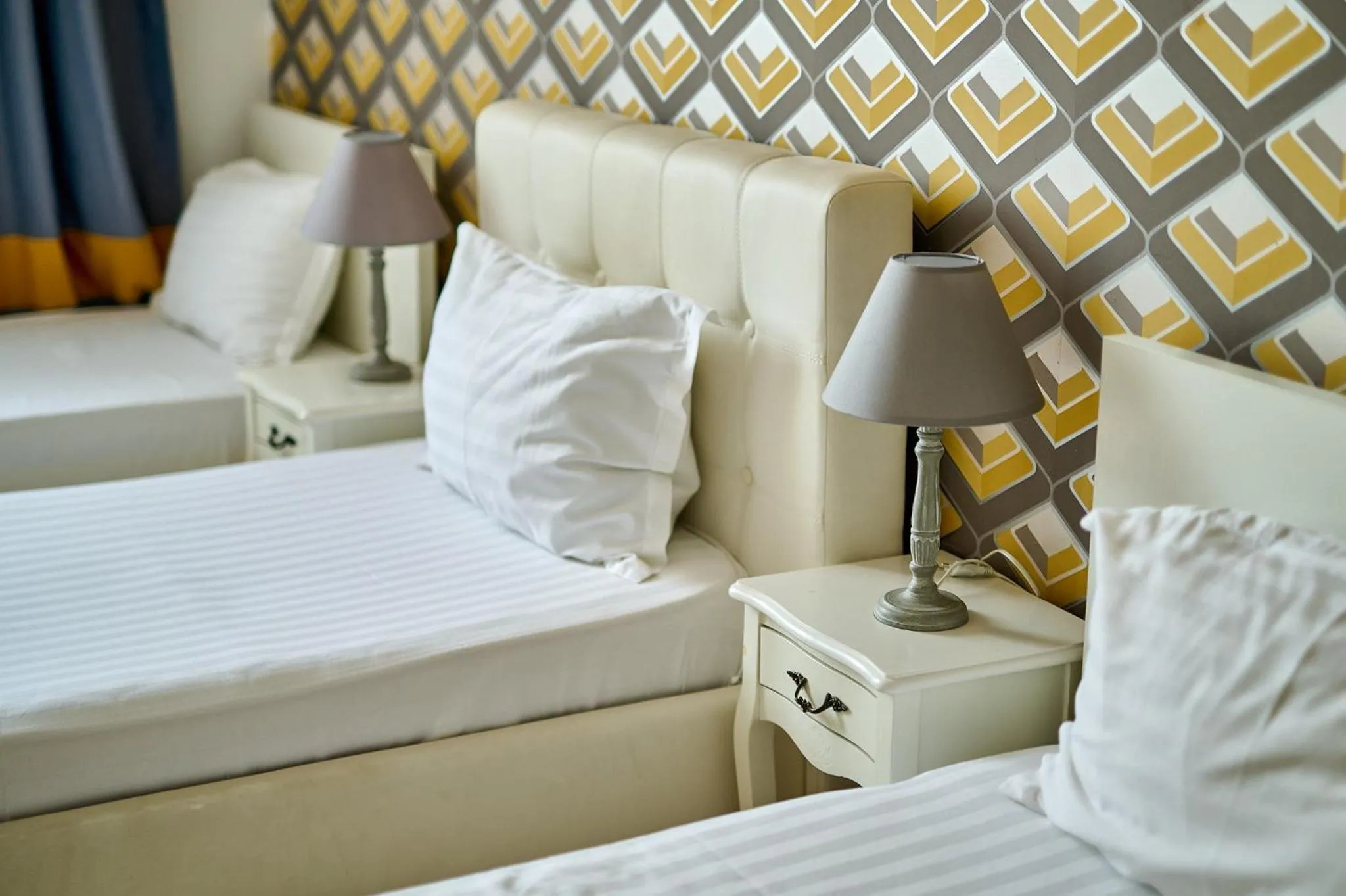 Bed in Hotel Evianne Boutique