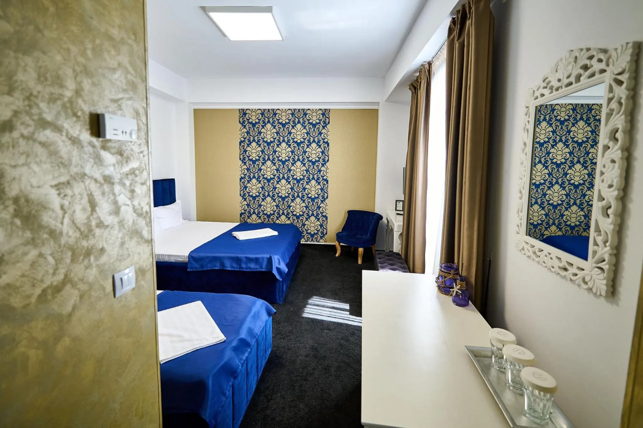 Bed in Hotel Evianne Boutique