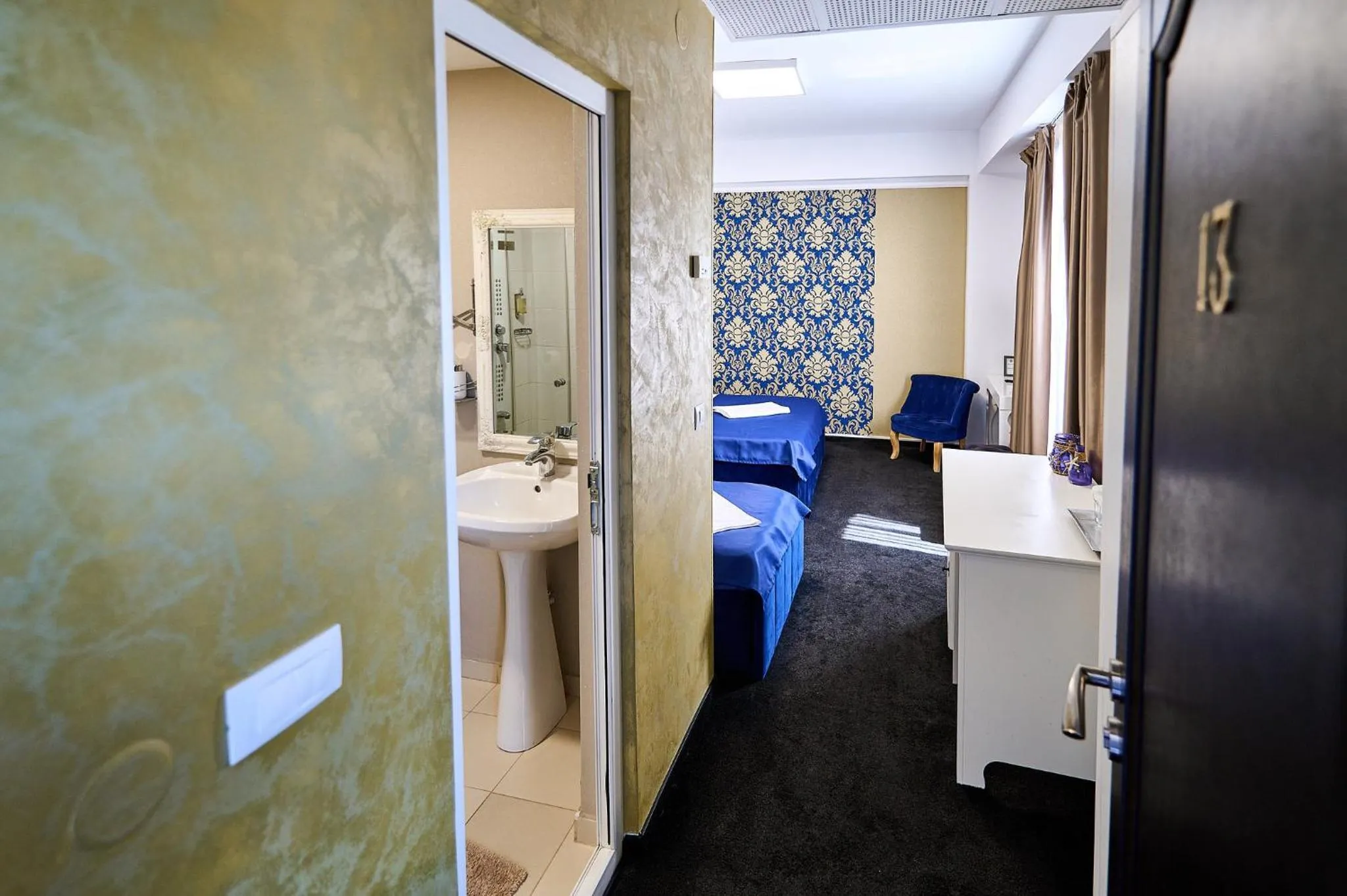 Bed in Hotel Evianne Boutique