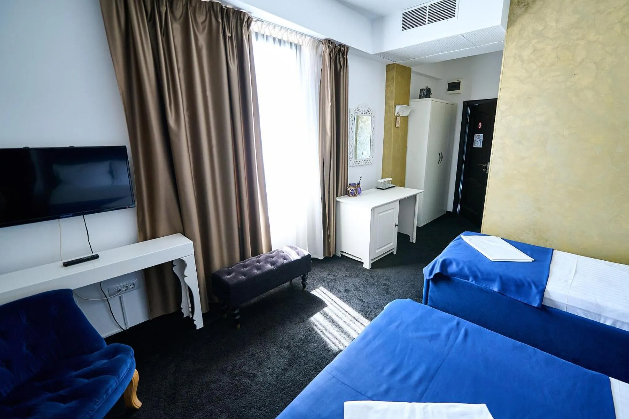 Bed in Hotel Evianne Boutique