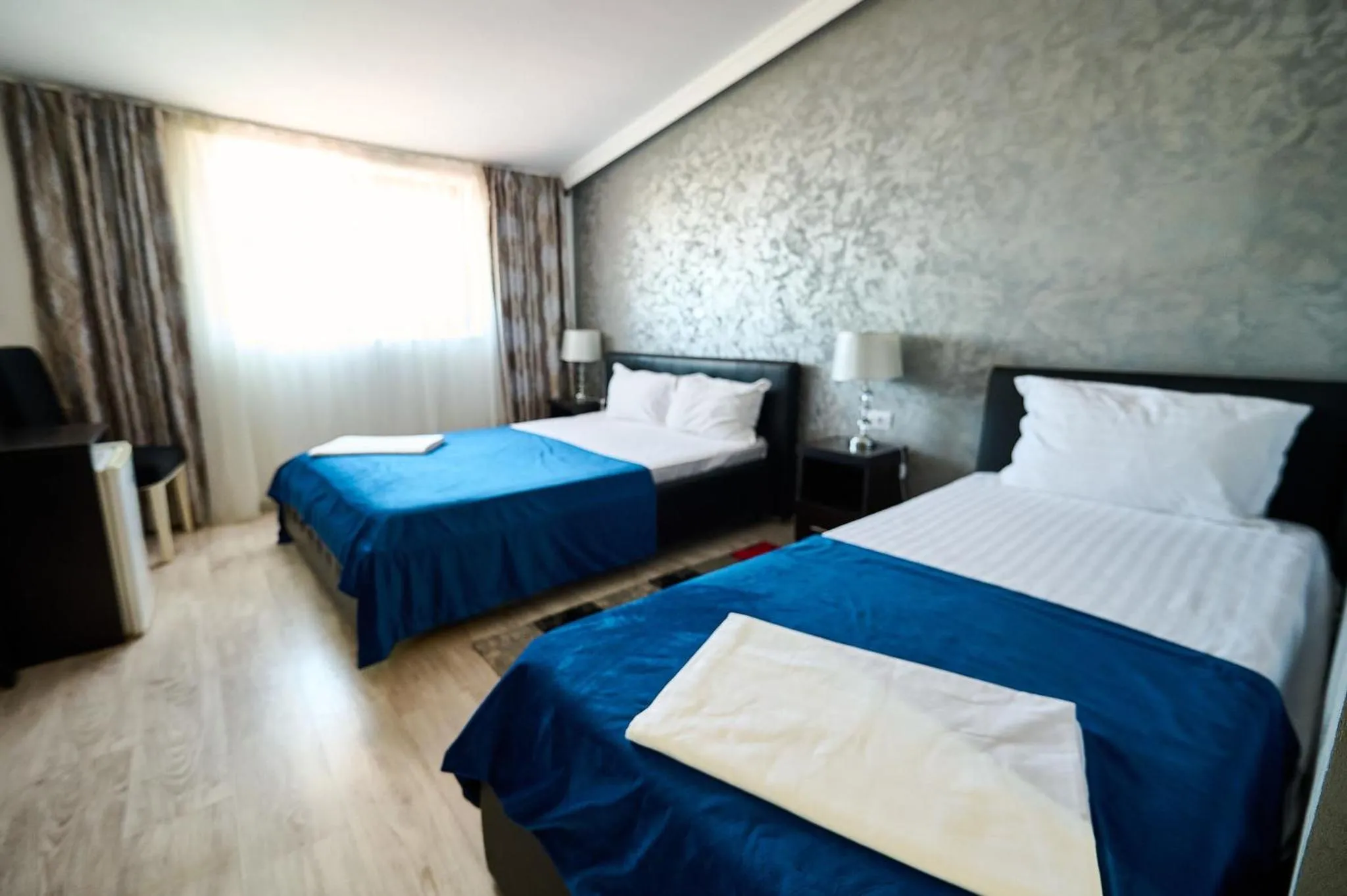 Bed in Hotel Evianne Boutique