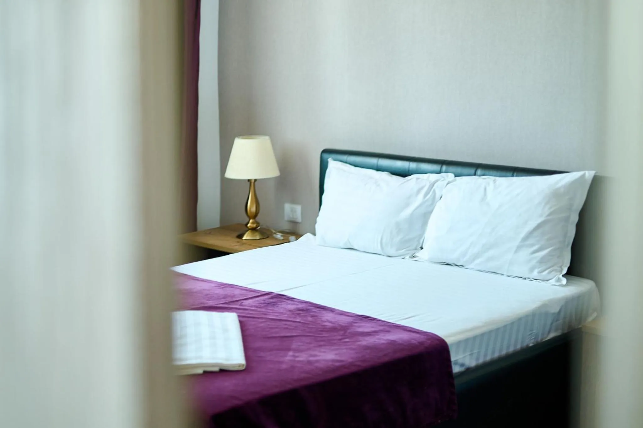 Bed in Hotel Evianne Boutique