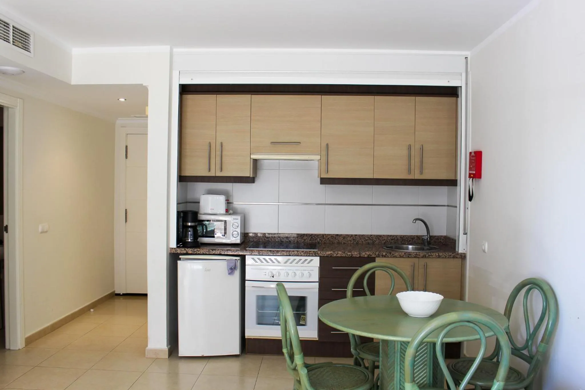 Kitchen or kitchenette in Apartamentos Larimar Unitursa