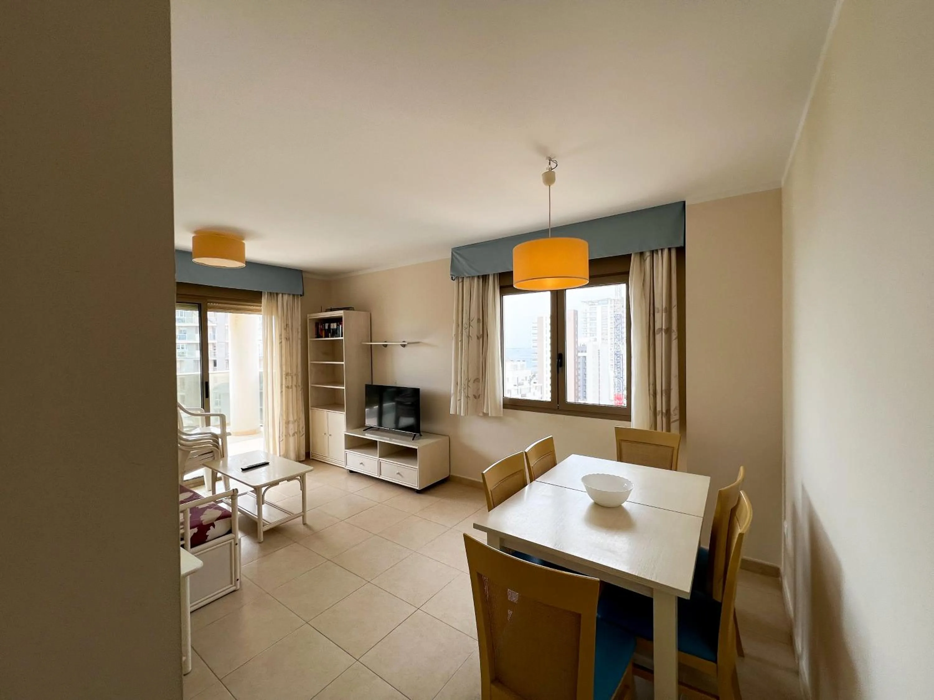 Living room, Bed in Apartamentos Larimar Unitursa