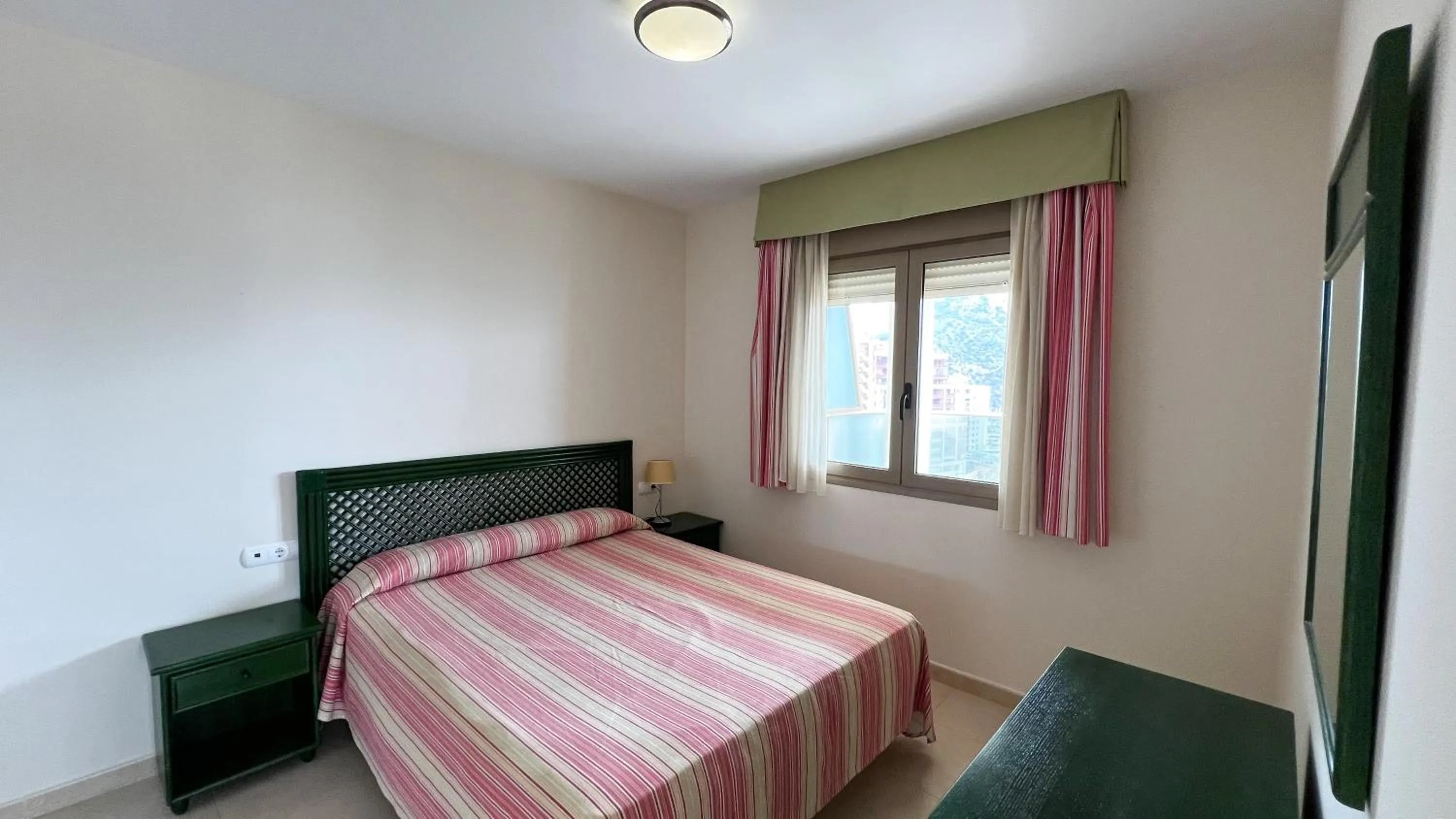 Bed in Apartamentos Larimar Unitursa