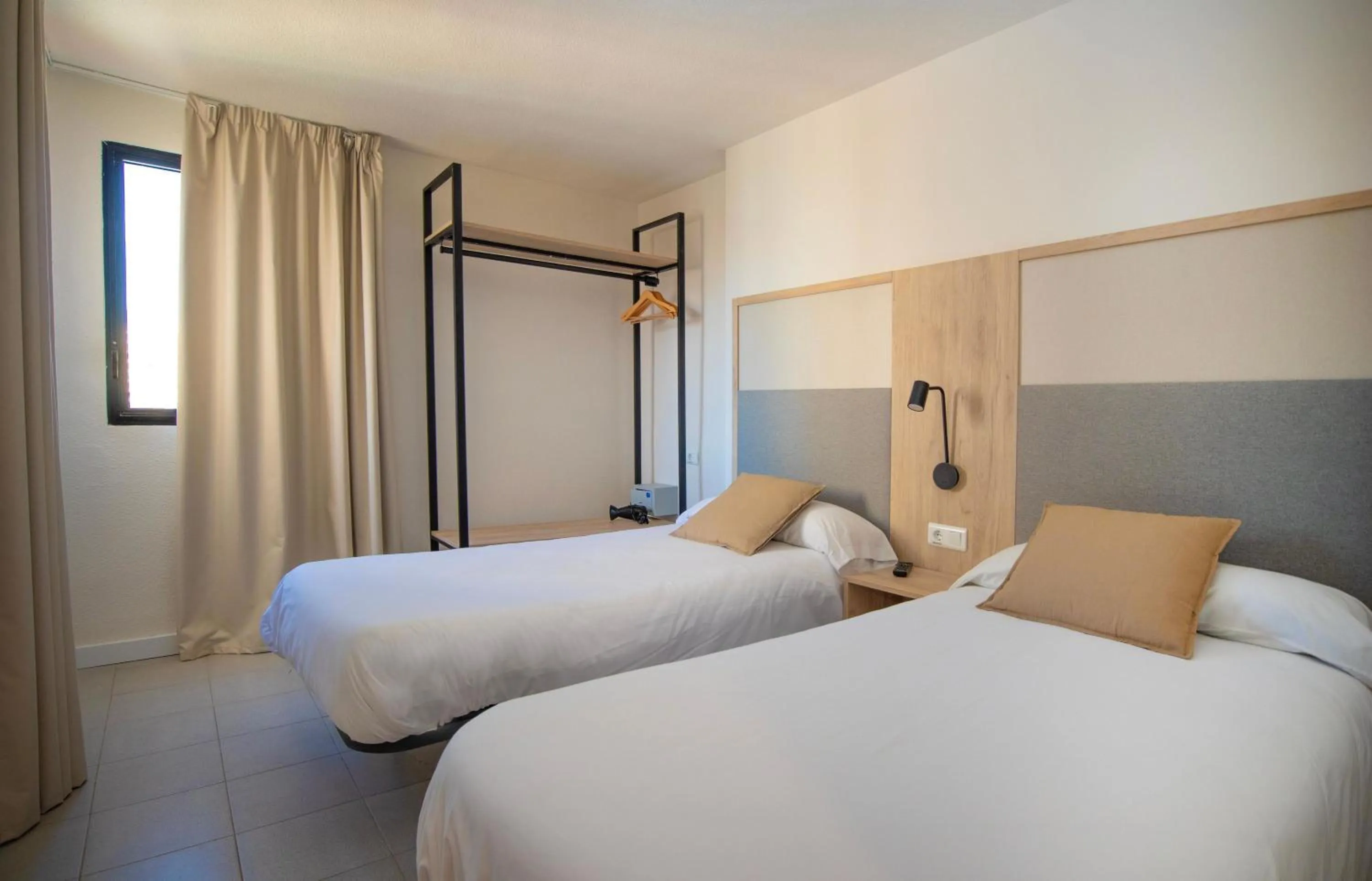 Bed in Dynastic Rooms Apartments