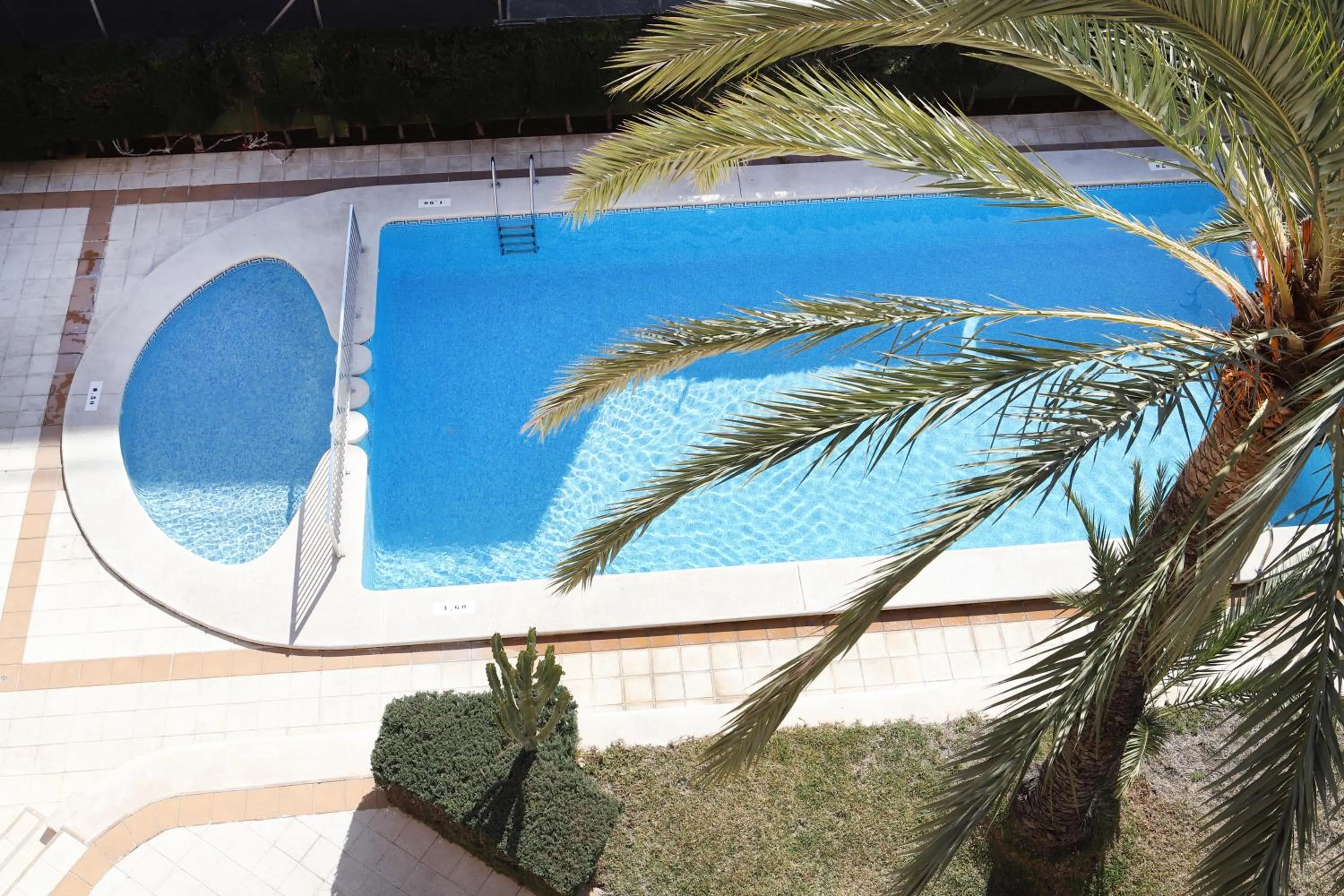 Pool view in La Caseta Apartments