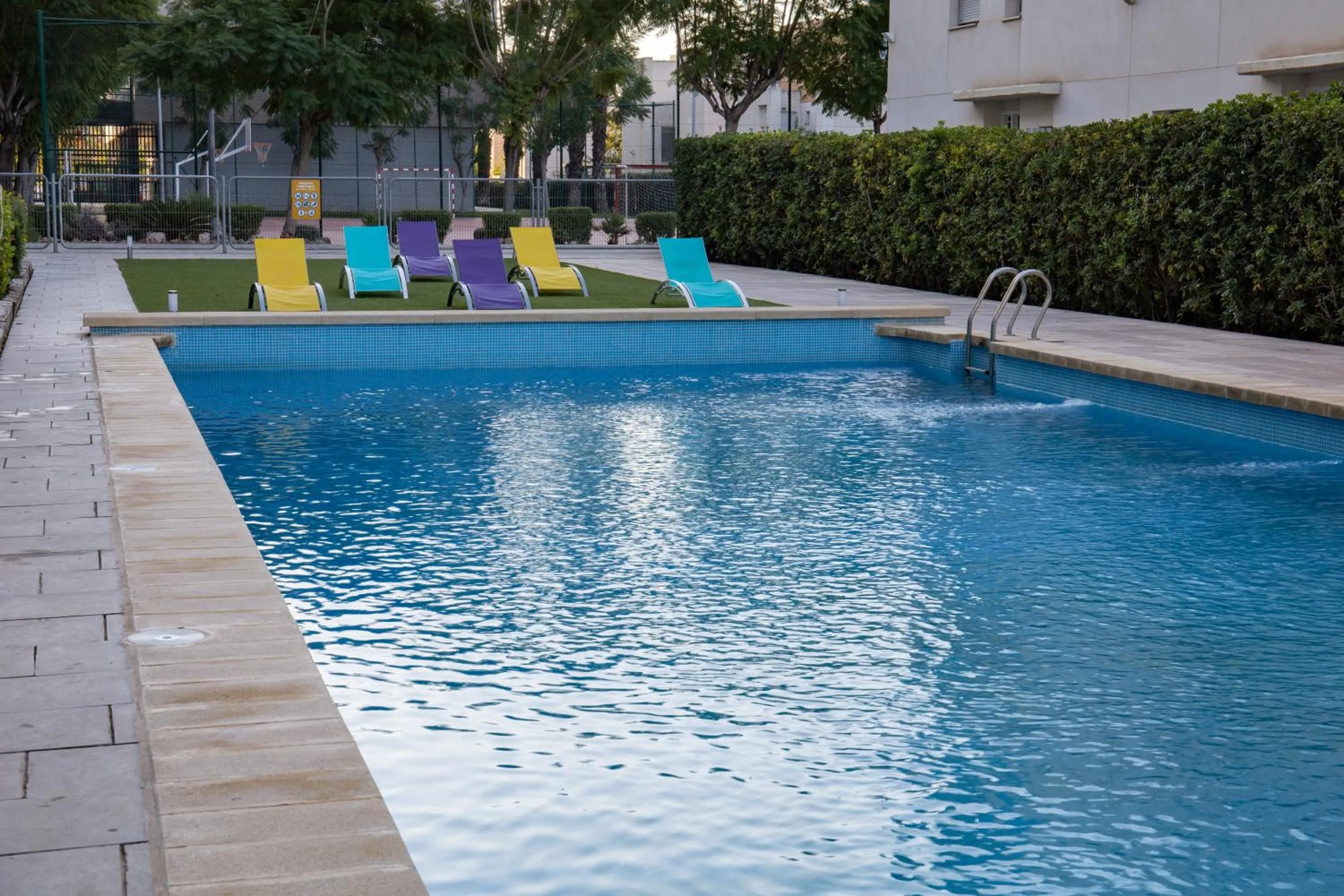 Swimming pool in Villa Alojamiento y Congresos - Villa Universitaria