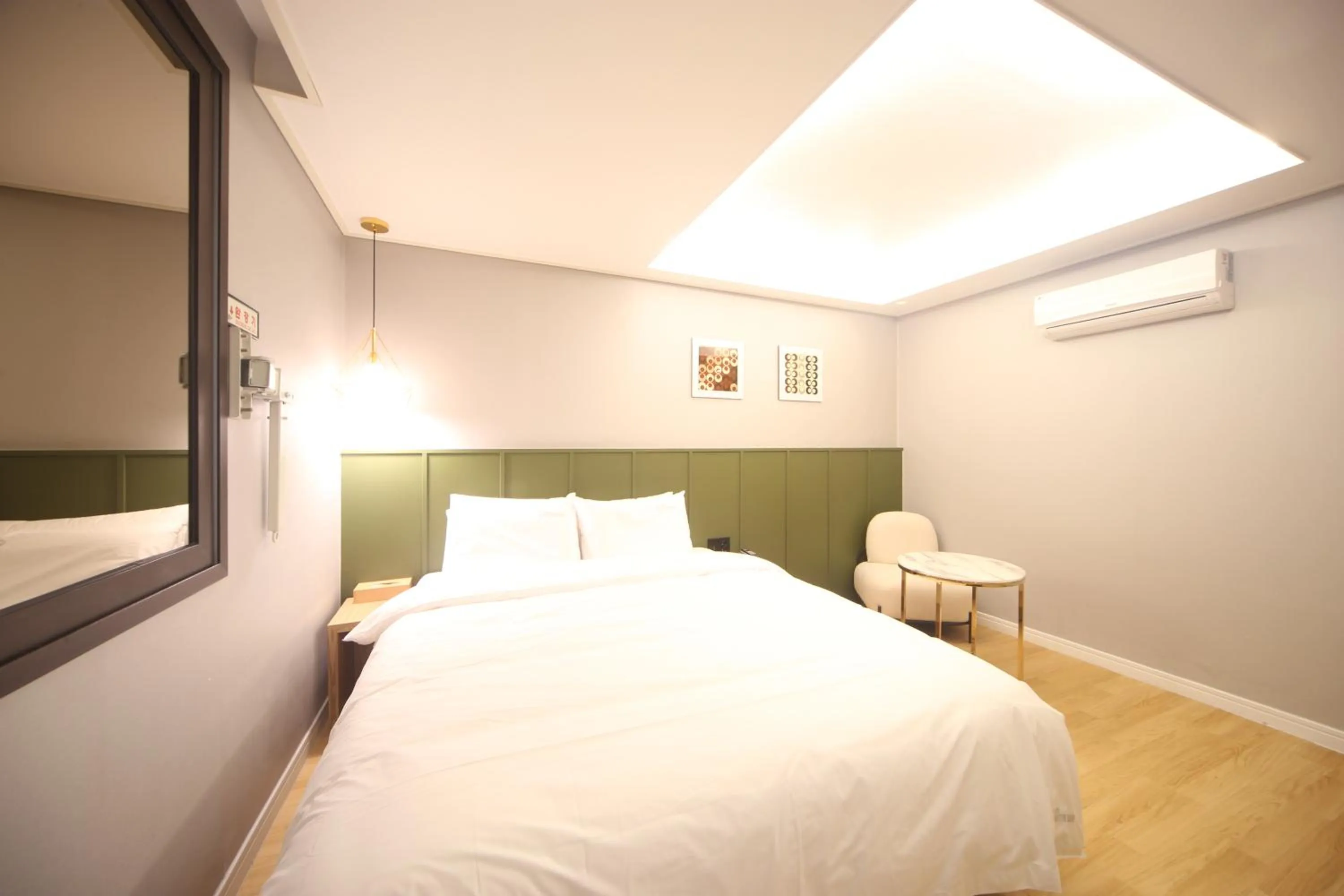 Bed in The Stone Bridge Hotel Sasang