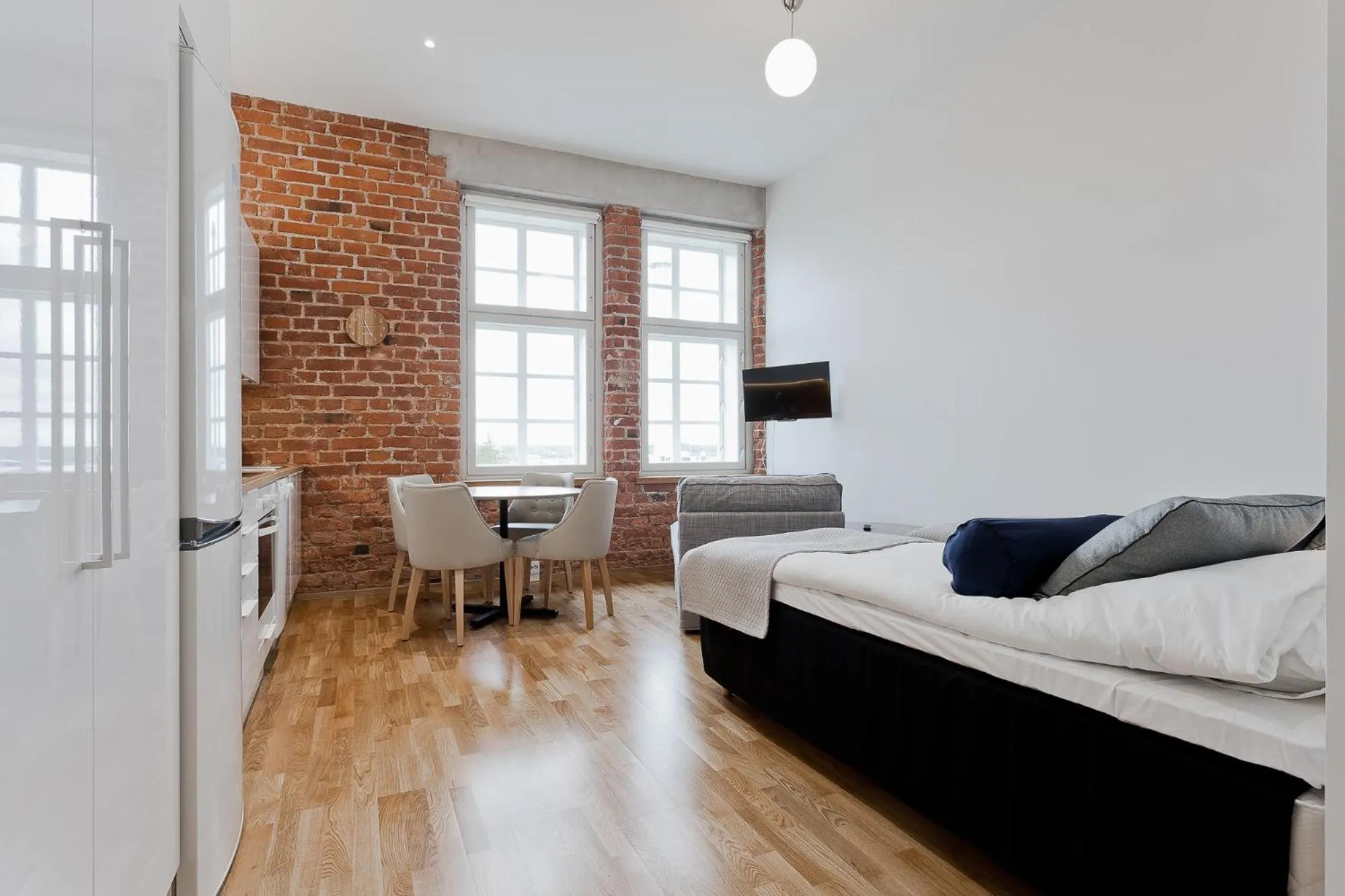 Living room, Bed in Forenom Serviced Apartments Turku Kakolanmäki