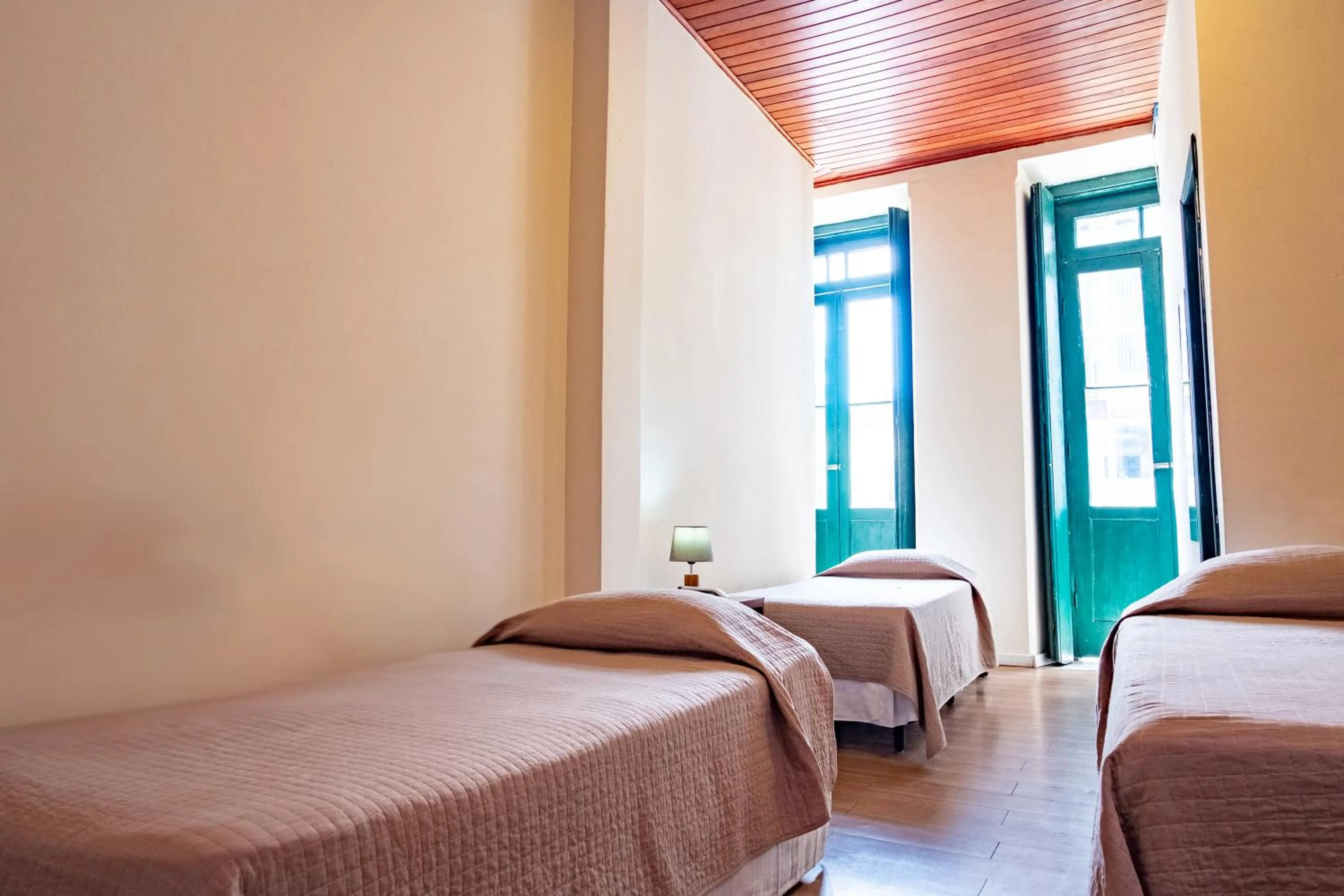 Bed in Pousada Colonial Chile