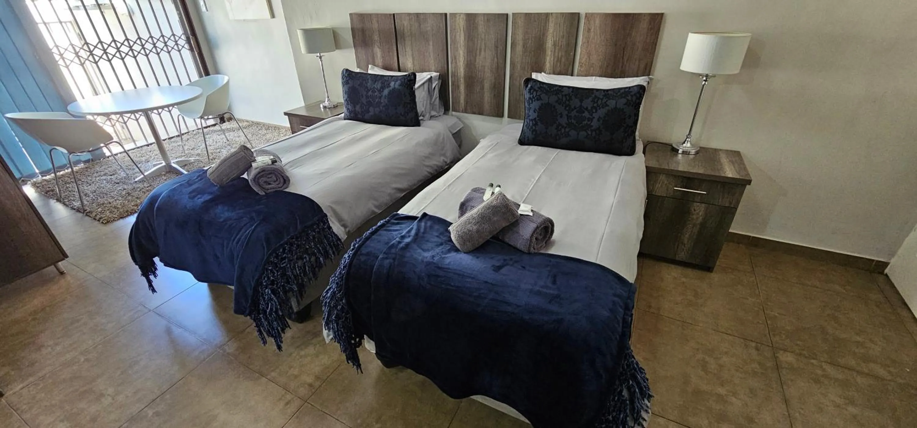 Bed in Blue Sparrow Guest House