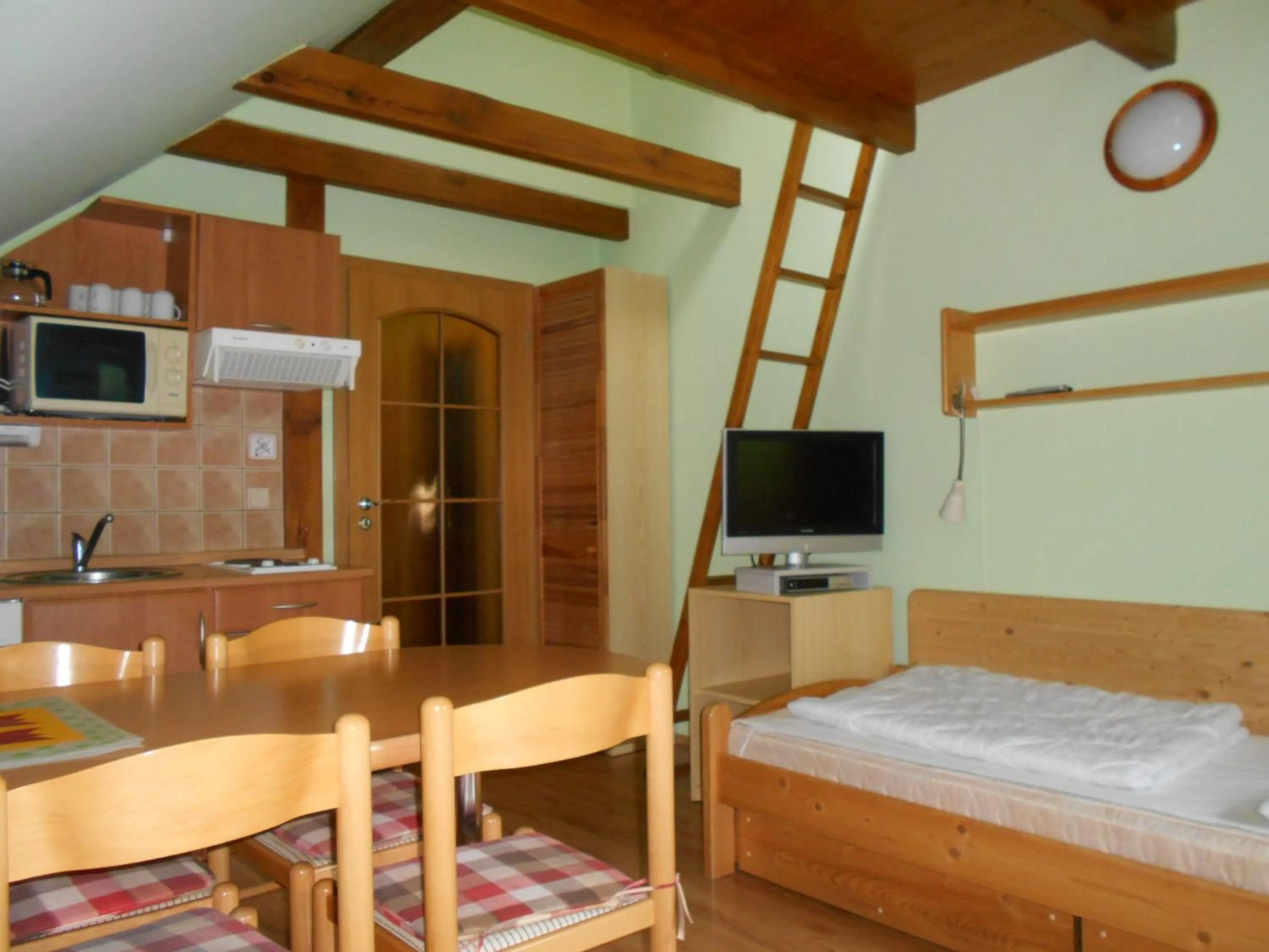 TV and multimedia, Bed in Apartmány Base Camp