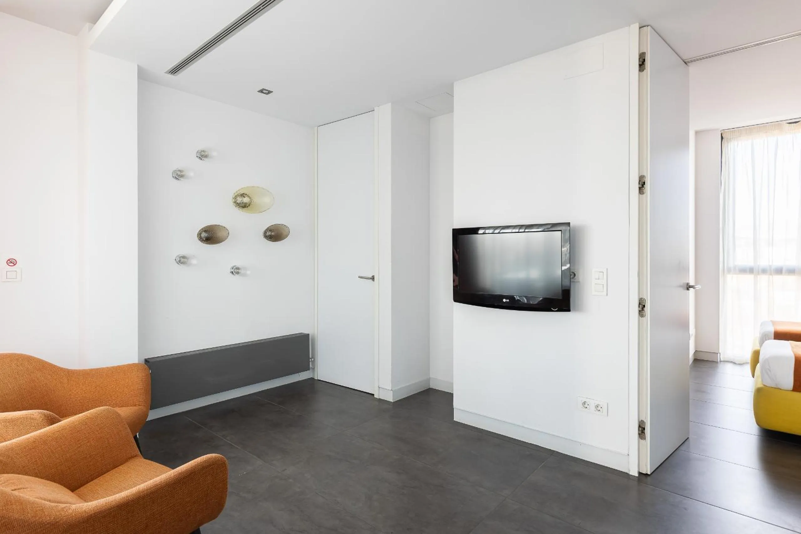 TV and multimedia in Cosmo Apartments Sants