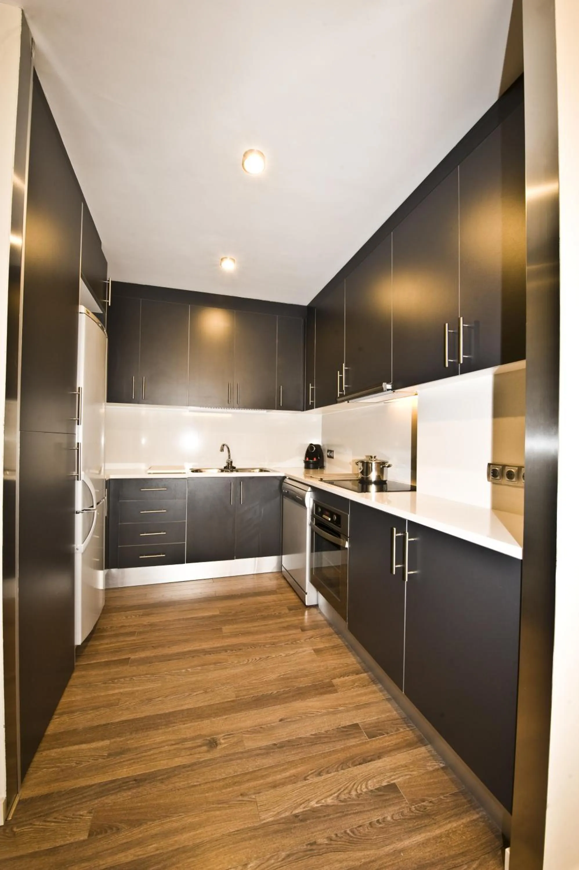 Kitchen or kitchenette in Casp 74 Apartments