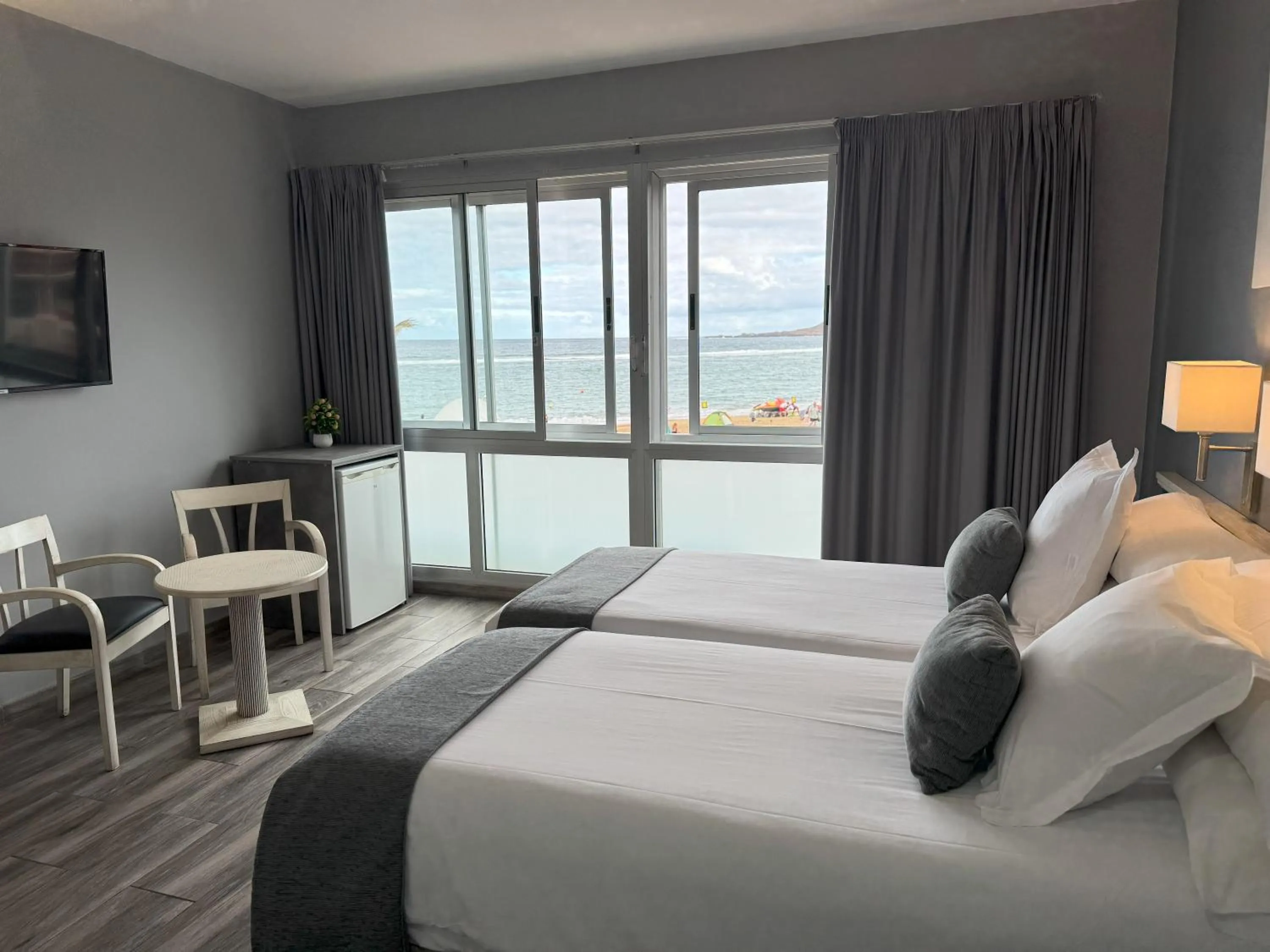 View (from property/room), Bed in Apartamentos Colón Playa