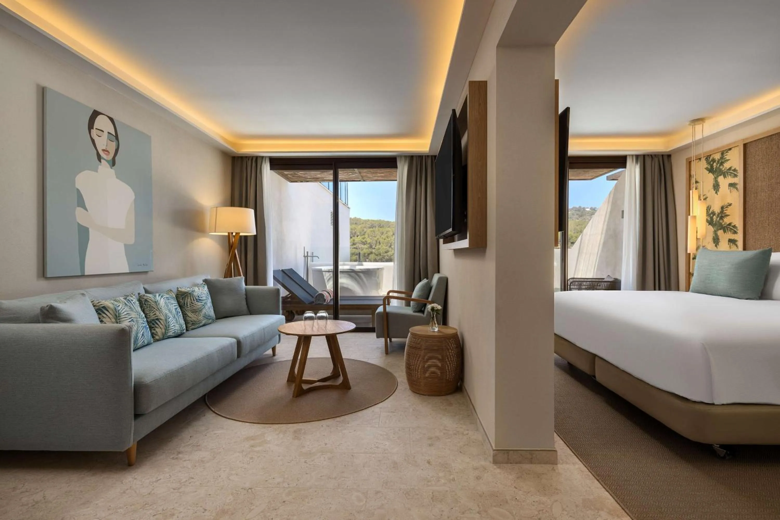 Living room, Bed in Cala San Miguel Hotel Ibiza, Curio Collection by Hilton, Adults only