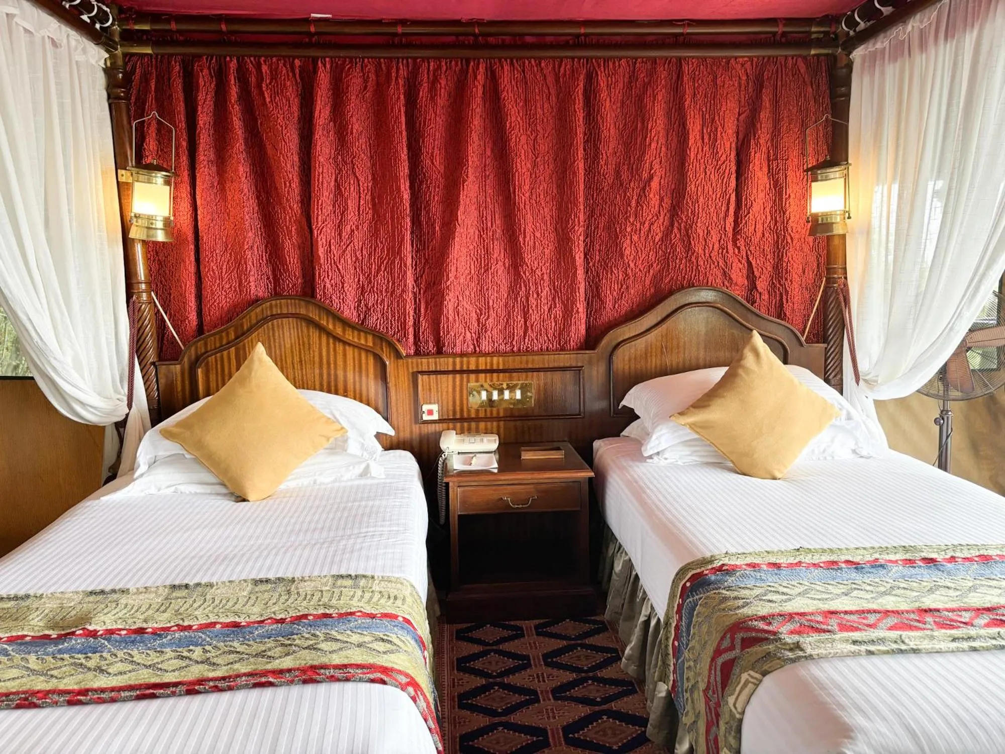 Bed in Kirawira Serena Camp