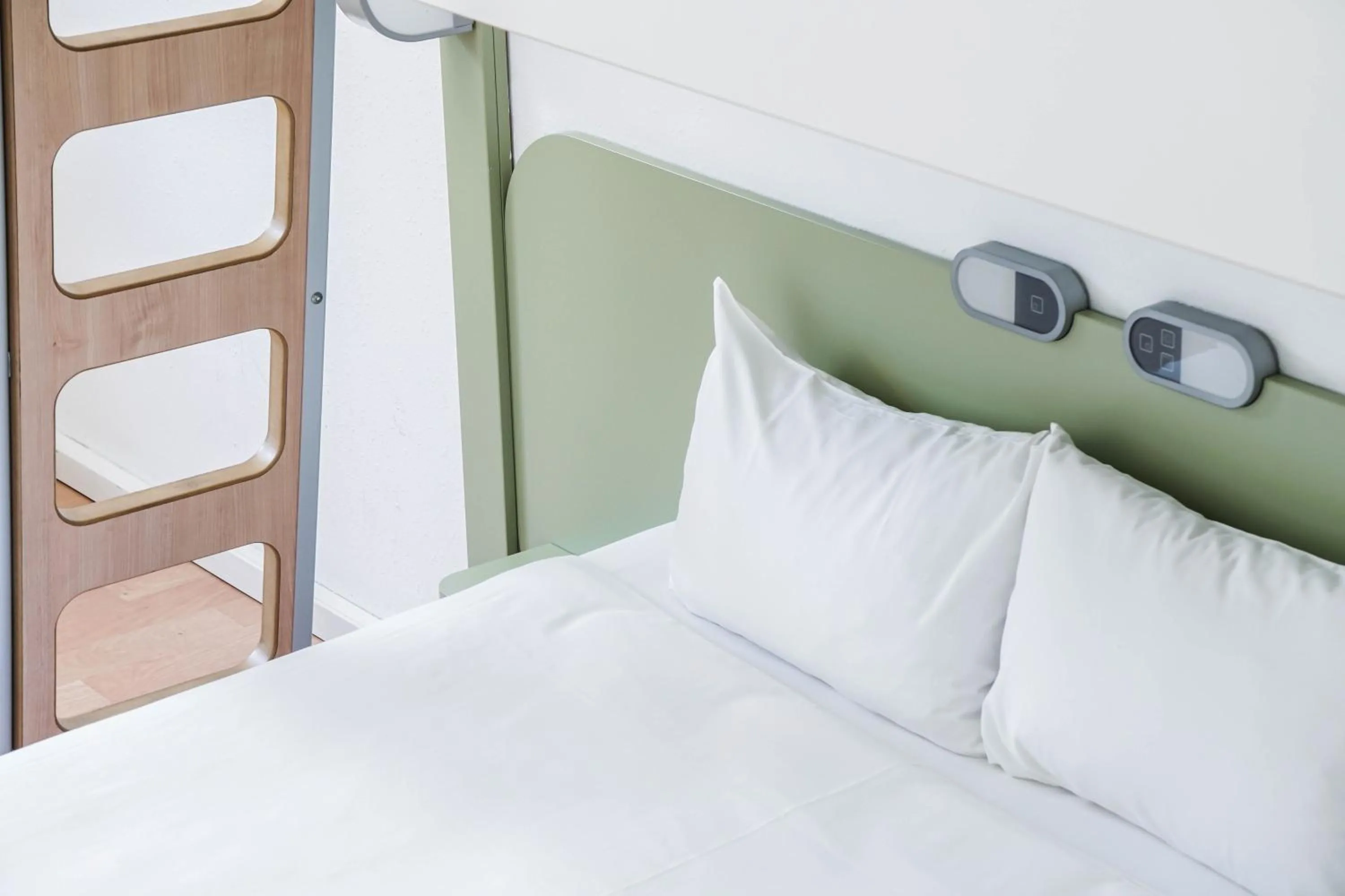 Bed in Ibis Budget Girona Costa Brava