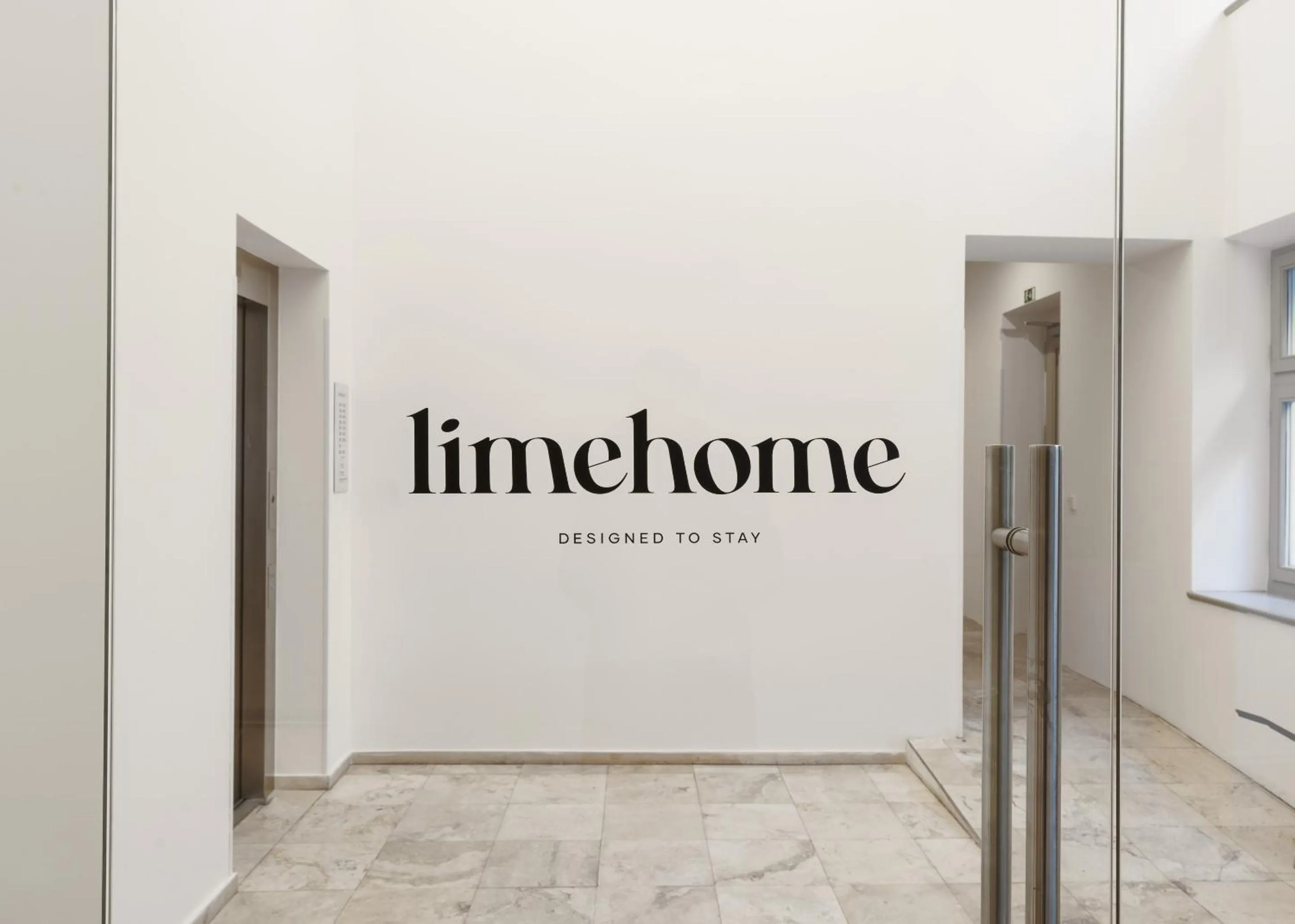 Property logo or sign in Limehome Prague Halkova