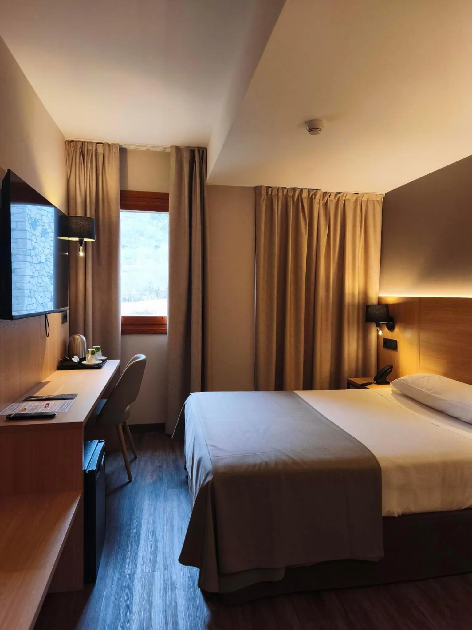 Bed in SOMMOS Hotel Benasque Spa