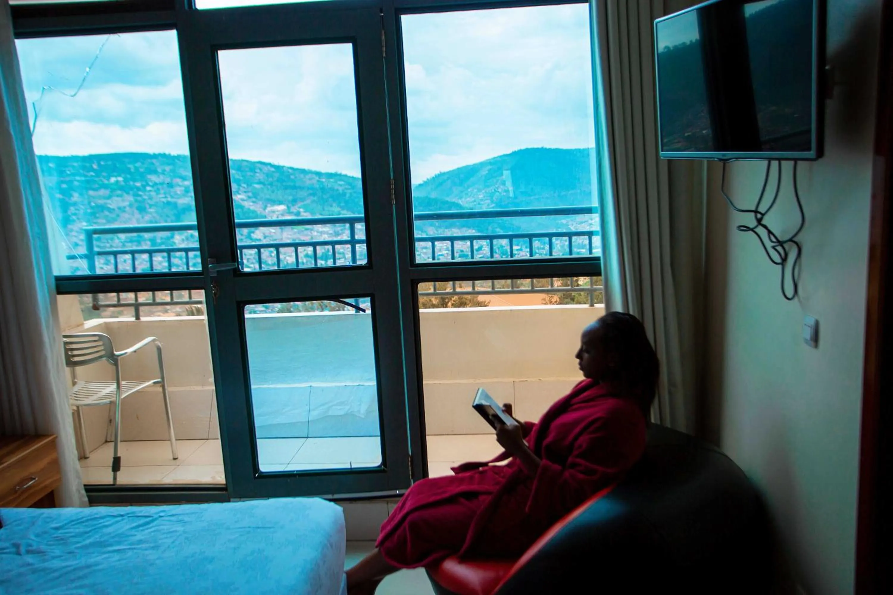 Bed in La Posh Hotel