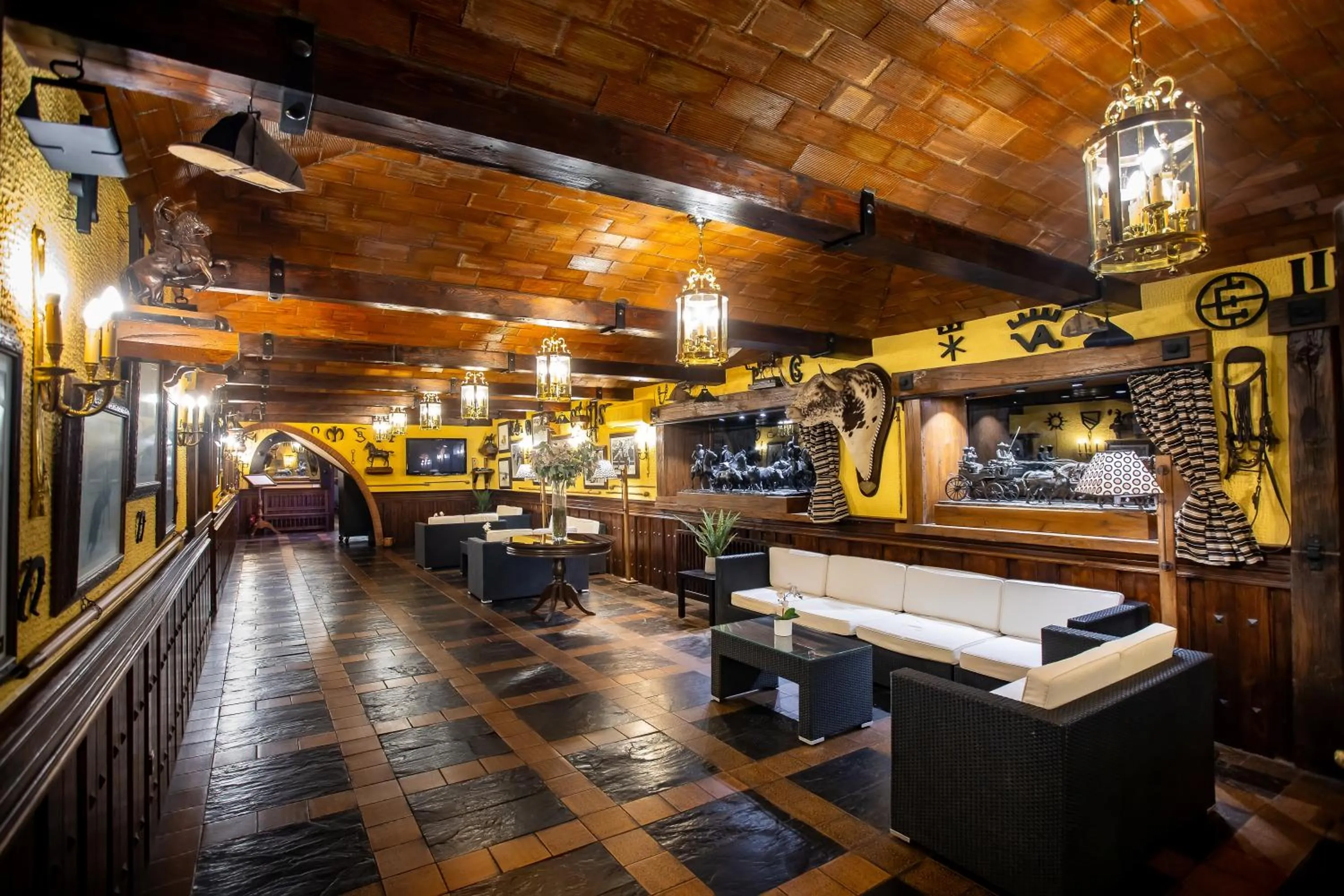 Living room in Hotel Conde Rodrigo II by eme hoteles