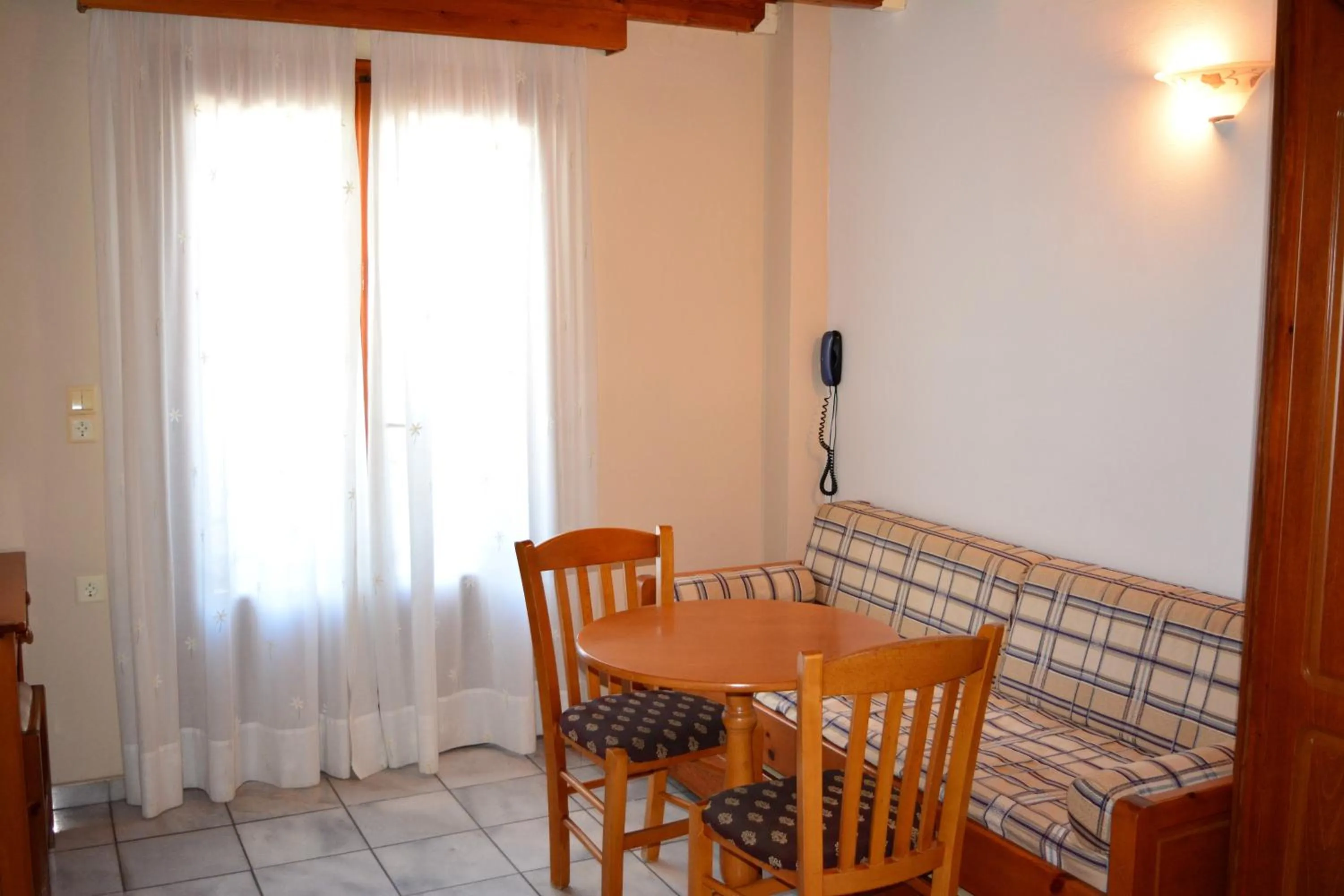 Living room in Anemomilos Suites