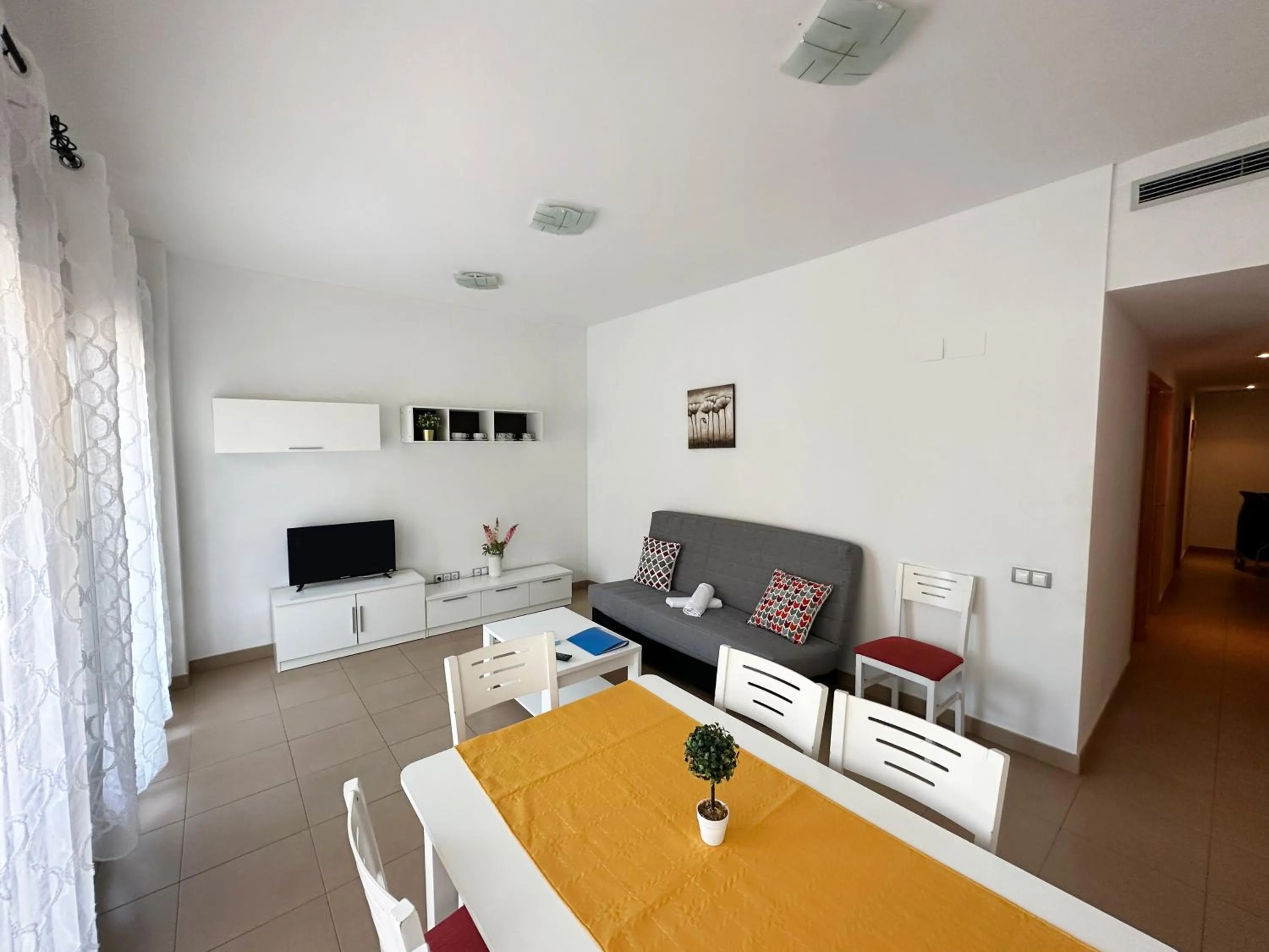 TV and multimedia in Apartamentos Alcocebre Suites 3000