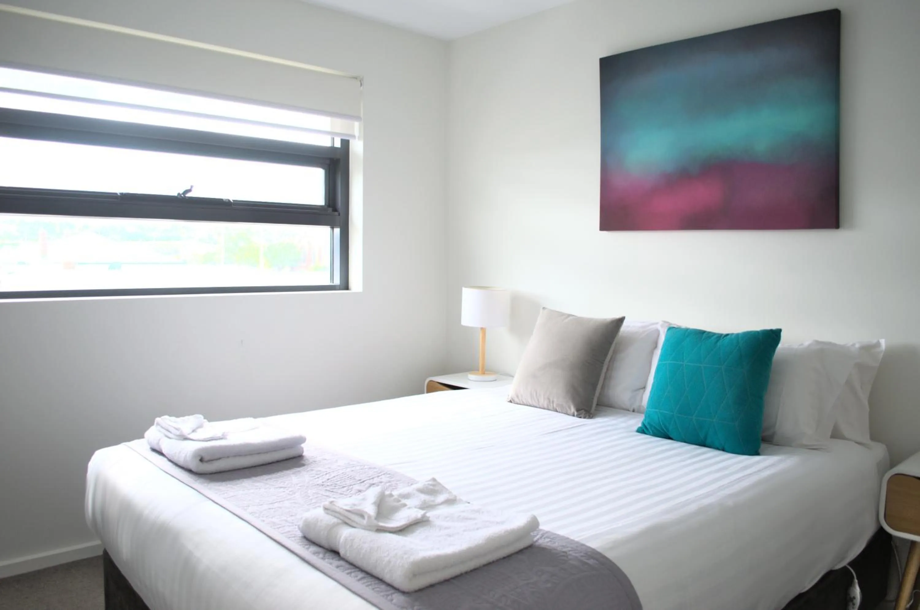 Bed in Kangaroo Bay Apartments