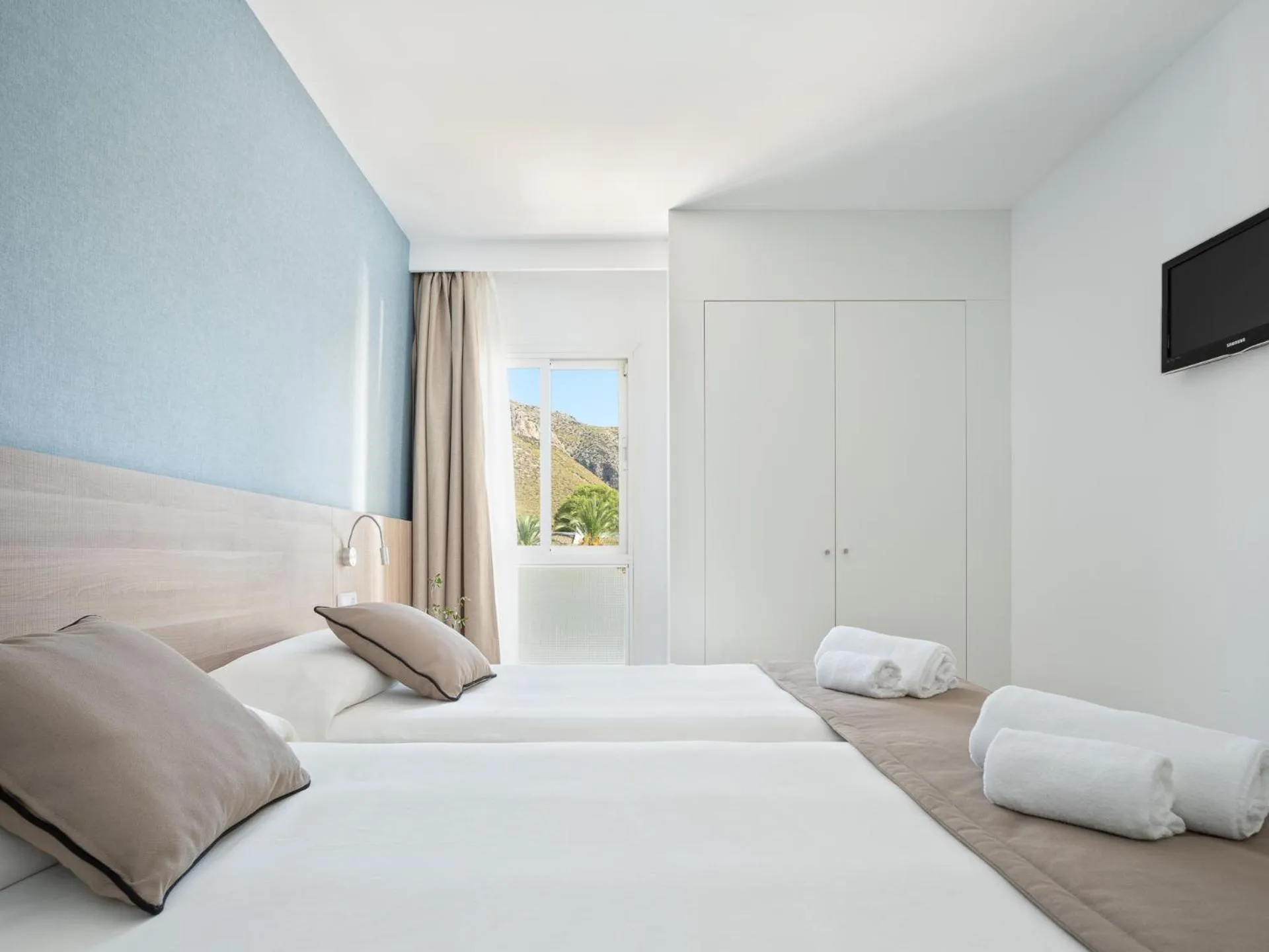 Bedroom in Puerto Azul Suite Hotel