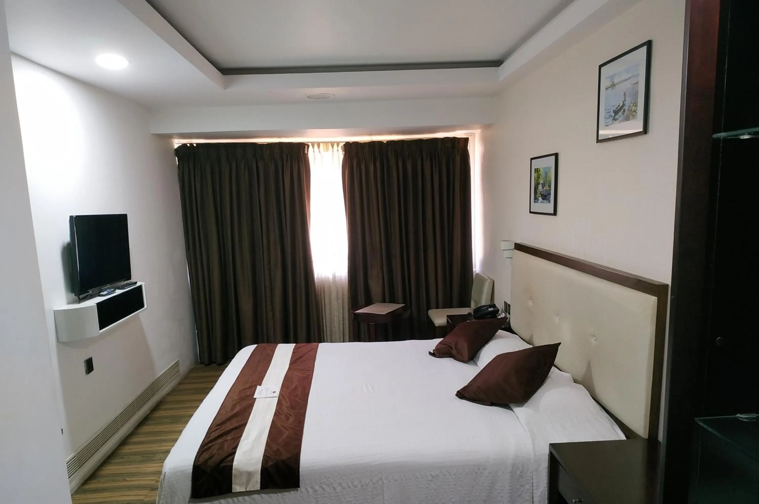 Bed in KGA Elite Continental Hotel