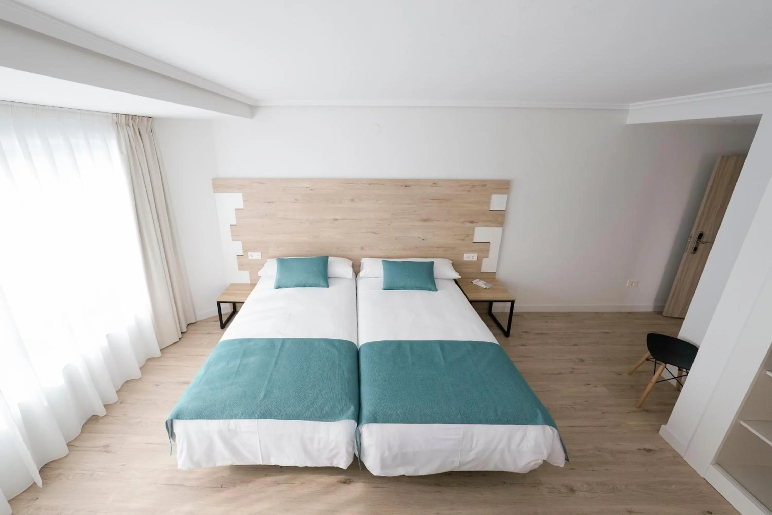 Photo of the whole room, Bed in Hotel VIDA Finisterre Centro