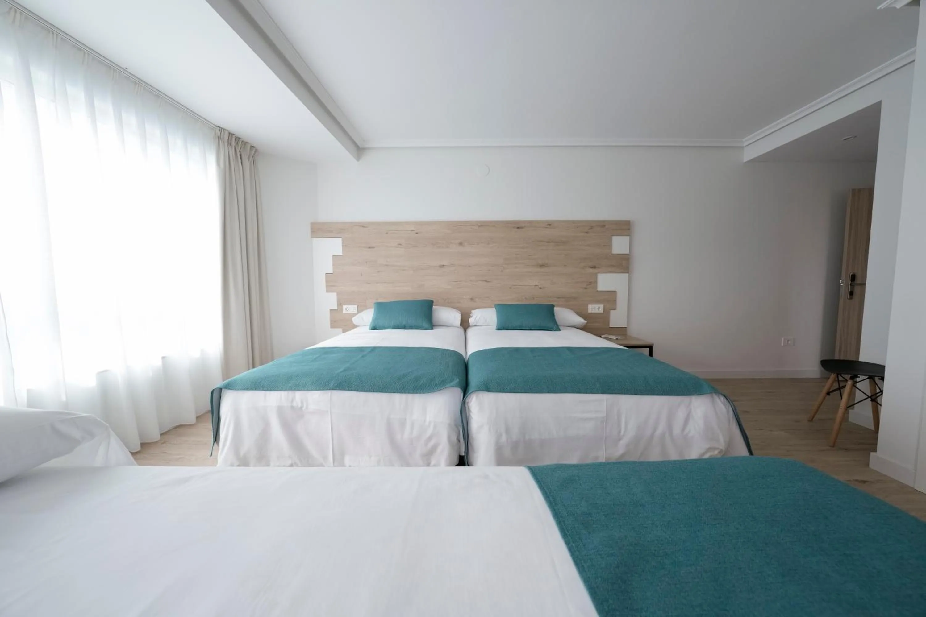 Photo of the whole room, Bed in Hotel VIDA Finisterre Centro